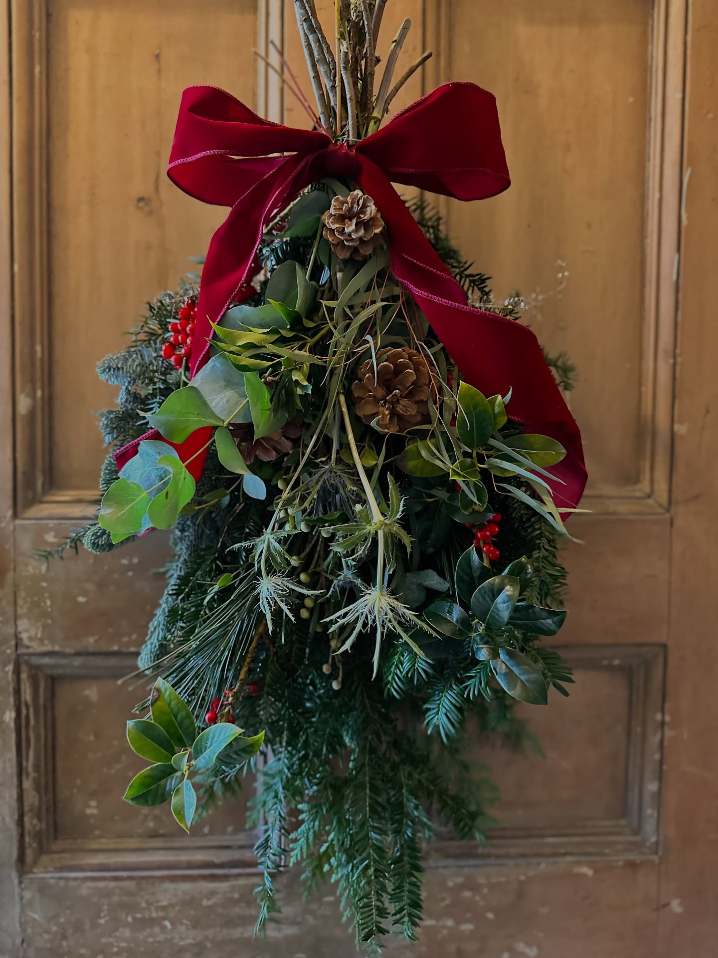 Have you heard of a Christmas swag? Well these are the younger wilder version of the popular Christmas wreath. Essentially an upside down flat bouquet of foliage decorated with accessories and a pretty bow.
🌲
We love them - they are quicker to make, cheaper and a bit more natural than a wreath.
🌲
If you’d like to learn how to make one then we have a workshop on Thursday 11th and Friday 12th December at 10am at our Harrold HQ.