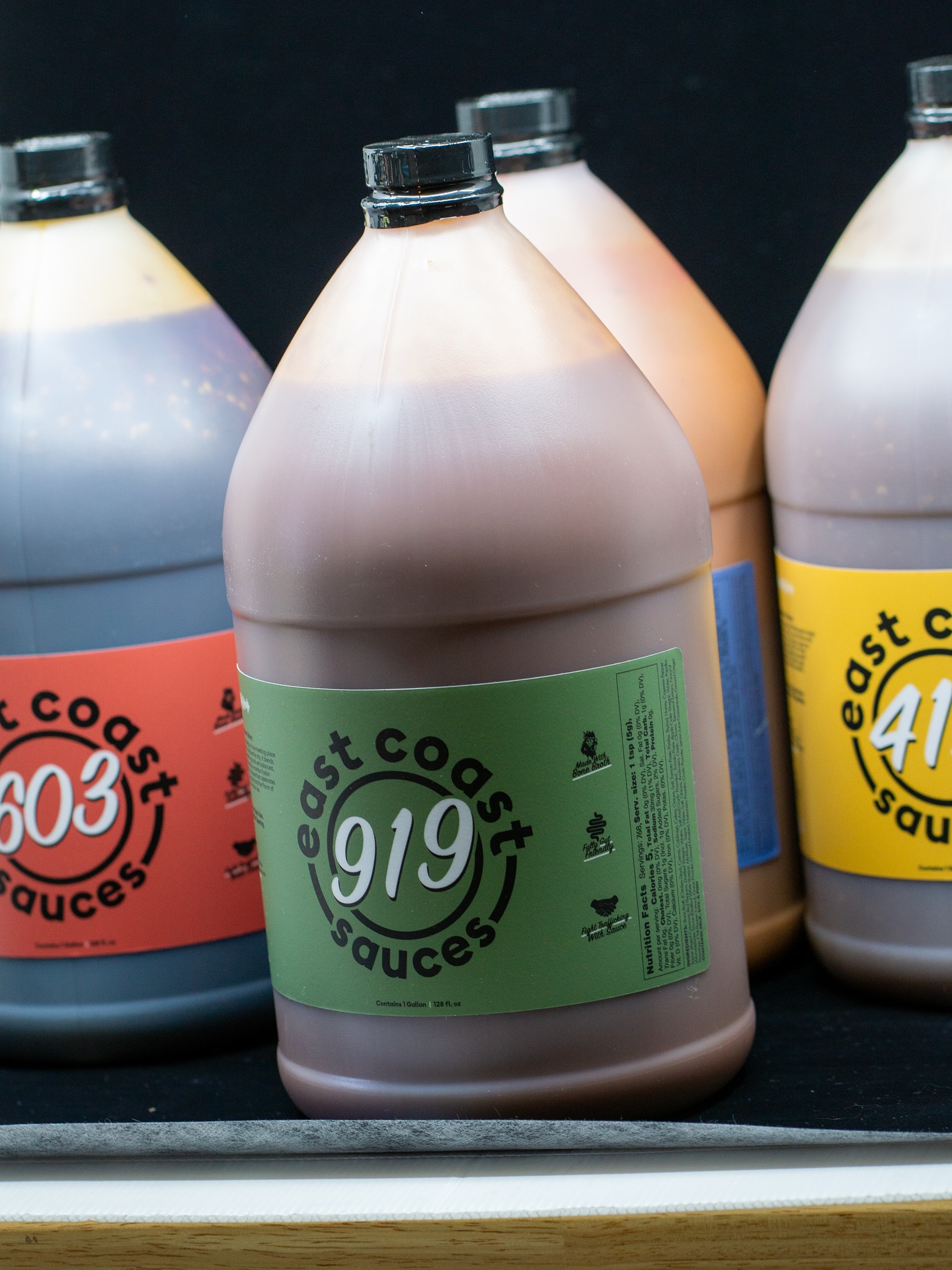 Finally!! A much sought after item is finally available! The 919 has a gallon form! Not to mention a fresh take on our labels for the gallons that tell the whole store! Go check it out on our site! #fueledbysauce #eastcoastsauces
