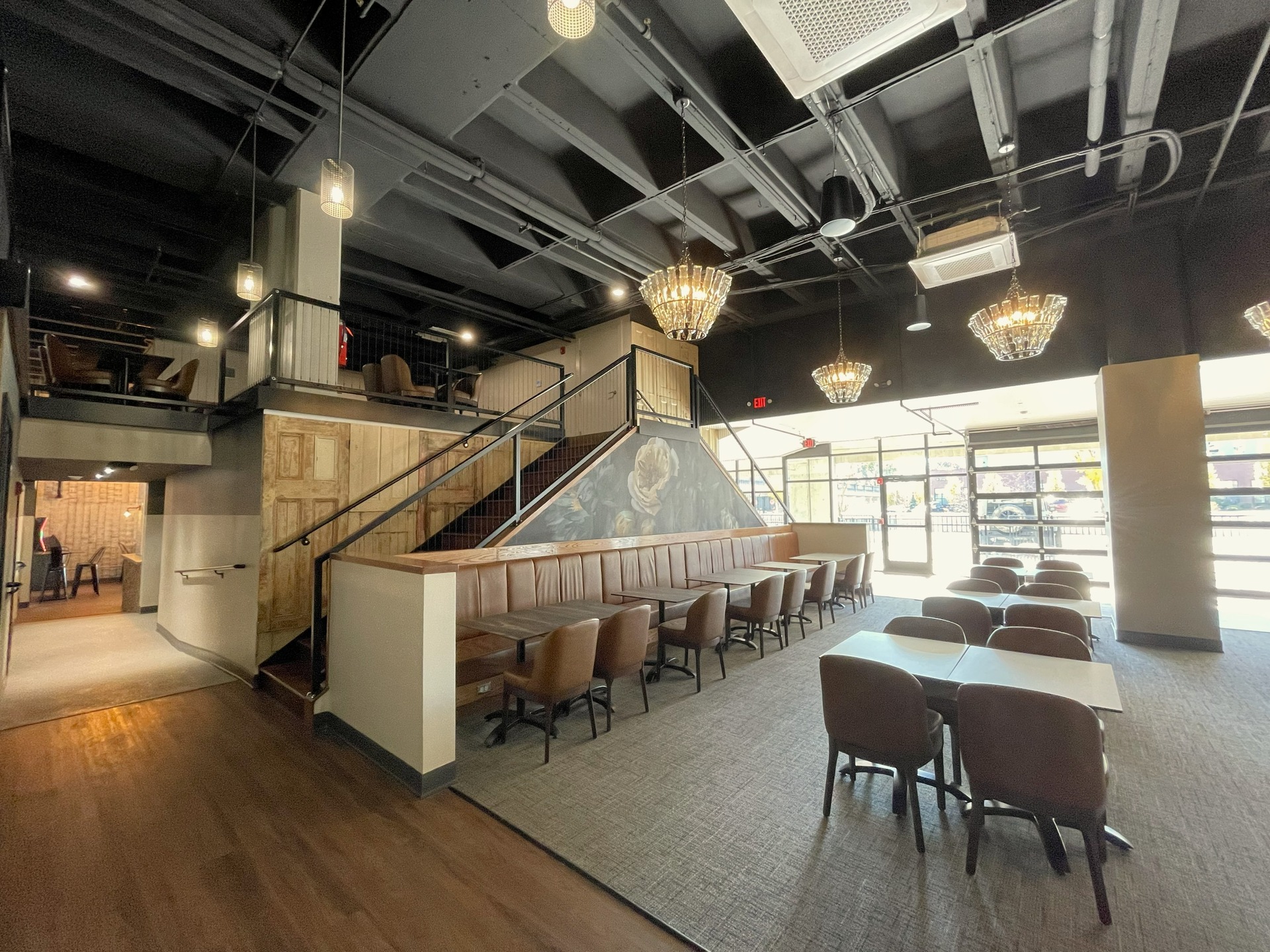 Our massive project @centertown_social at Clemens Square is complete, officially open Monday, November 17th! It's been a long and exhausting journey, nearly three years in the making now come to fruition!
Centertown Social is a brewery-style bar and restaurant with an upper mezzanine level, a massive gaming section, and an outdoor stage area to anchor this new and exciting community gathering space!
Situated in the pedestrian mall of the Centertown Parking Garage, the space had been shuttered for many years, once housing Chuck Clark's Bar & Restaurant, The Red Room, a John Deere Showroom, and Deister & Butler Jewelers.
Centertown Social takes up nearly 70% of the mall's floorspace, and sports all new floor-to-ceiling windows, with large overhead doors that allow for easy flow between the indoor and outdoor areas of the restaurant next to the Clemens Square Stage. The general seating consists of several large custom-built booths, a VIP lounge area, a two-sided fireplace, and ample tables near the center and up on the mezzanine level, which was built above the state-of-the-art-kitchen, overlooking both the main dining room and the bar area. The booths and tabletops were all locally made by GoJu Custom Woodworking & Laser Engraving. Beyond the general seating is the large gaming area, which features two golf simulators, darts, billiards, as well as various arcade games. Other finishes will include wall art from local artists, and custom outdoor lighting for night events.
More details to follow soon, including other unique planned activities for this massive space!
Visit www.centertownsocial.com to learn more!
#capriottiproperties #centertownsocial #clemenssquare #downtownelmira #downtownrevitalization #elmira #elmiracorning #elmiradowntown #elmirany #exploreelmira #restaurant #arcade