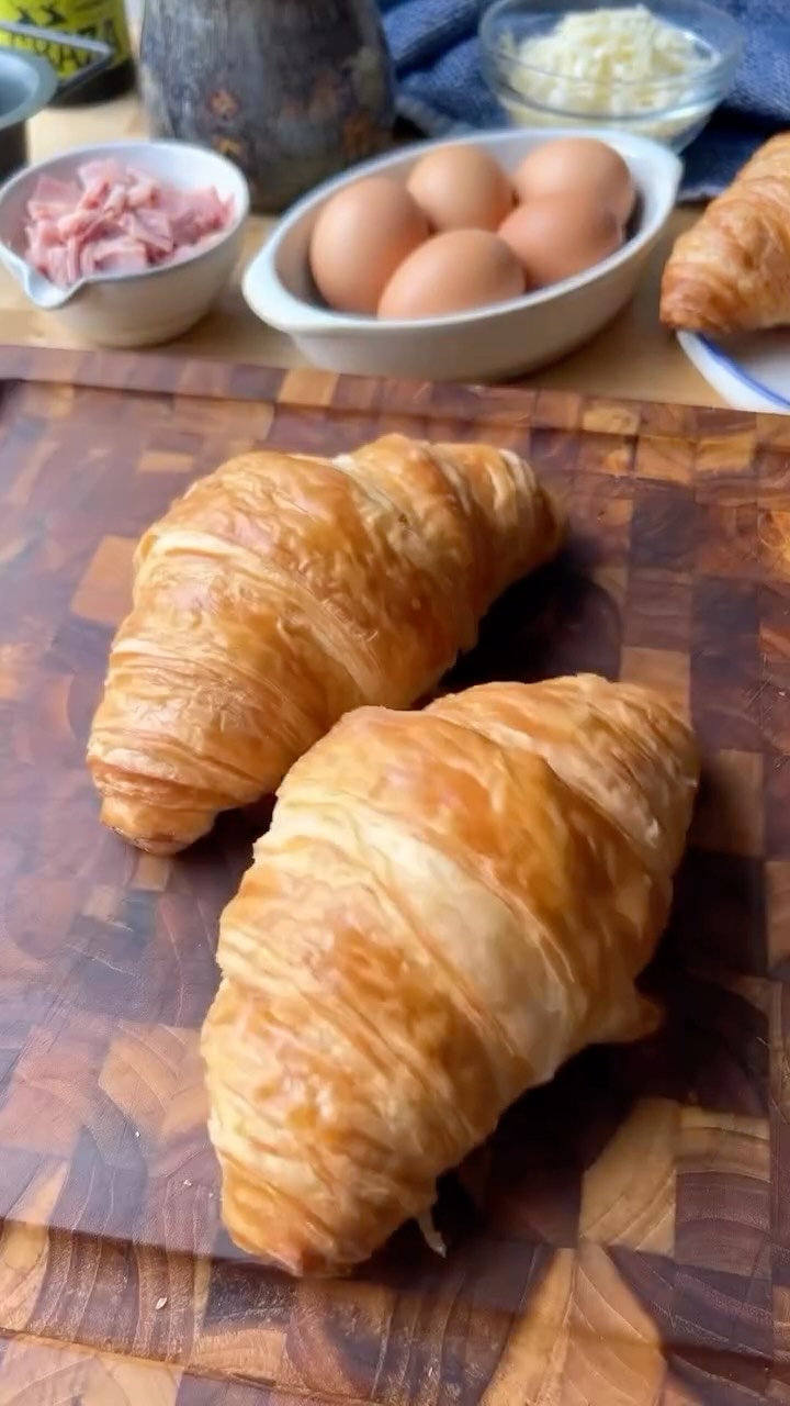 American take on French croissants 🙂👍@frohneats These Croque Monsieur Breakfast Croissants 🥐🥐 are the ultimate brunch move - buttery, cheesy, and stuffed with layers of black forest ham, melty gruyère, and creamy béchamel. 🔥
They bake up golden and crisp with that perfect pull-apart bite every time!
Make sure to save this and share it with someone who’d trade their mimosa for this! 🥂
🥐Stuffed Croque Monsieur Breakfast Croissant Cones 🥐
Serves 6
3 Large Croissants, Cut in Half
Avocado Oil
Eggs
Heavy Cream
Kosher Salt
Black Pepper
Granulated Garlic
Dijon Mustard
Black Forest Ham
Shredded Gruyere Cheese or Mozzarella/Provolone Cheese Blend
Garnish with Chopped Chives
🥐(Comment croissant and I’ll DM the full recipe)🥐
Spray a deep muffin pan with avocado oil spray to coat. This is going to help your muffins come out of the pan so much easier if any of the egg custard seeps out when baking.
Cut the croissants in half, hollow out the middle, and place into the muffin pan. Add chopped ham into each croissant.
Divide the savory egg custard into each croissant, and top with remaining cheese. Cover with foil and bake at 350 degrees for 20-25 minutes until the egg custard is set.
Serve with warm bechamel and top with chopped oh La La you’ll have an absolutely 🔥🔥🔥 breakfast!
