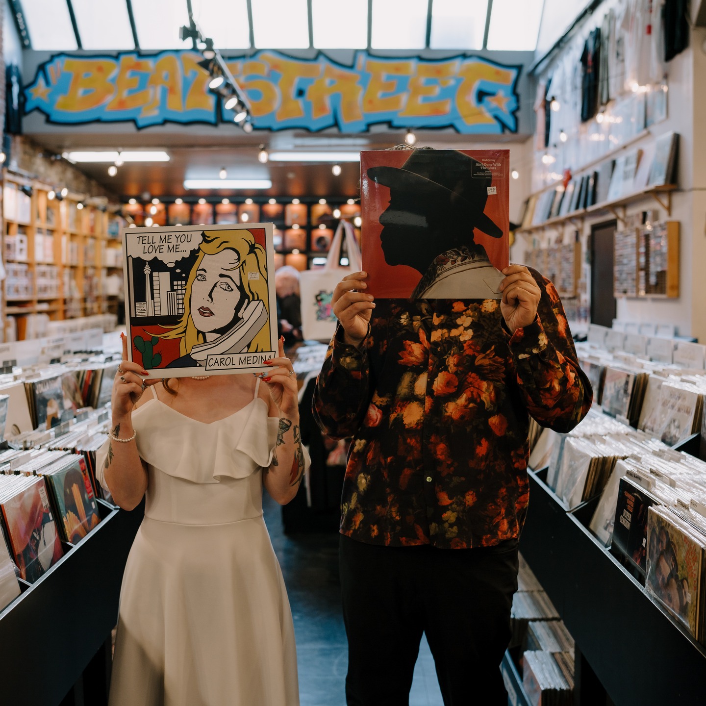 Between flipping through vinyl and vibing out. Carson + Meara turned Beats Street Record Store into their own little world 🎶
This wasn’t your average engagement session and that’s exactly the point.
More of this, please. Cookie-cutter photos aren’t your thing and you want a session that actually feels like you. Let's do something different, wacky, whatever ideas you have, let's do it! Who's in?