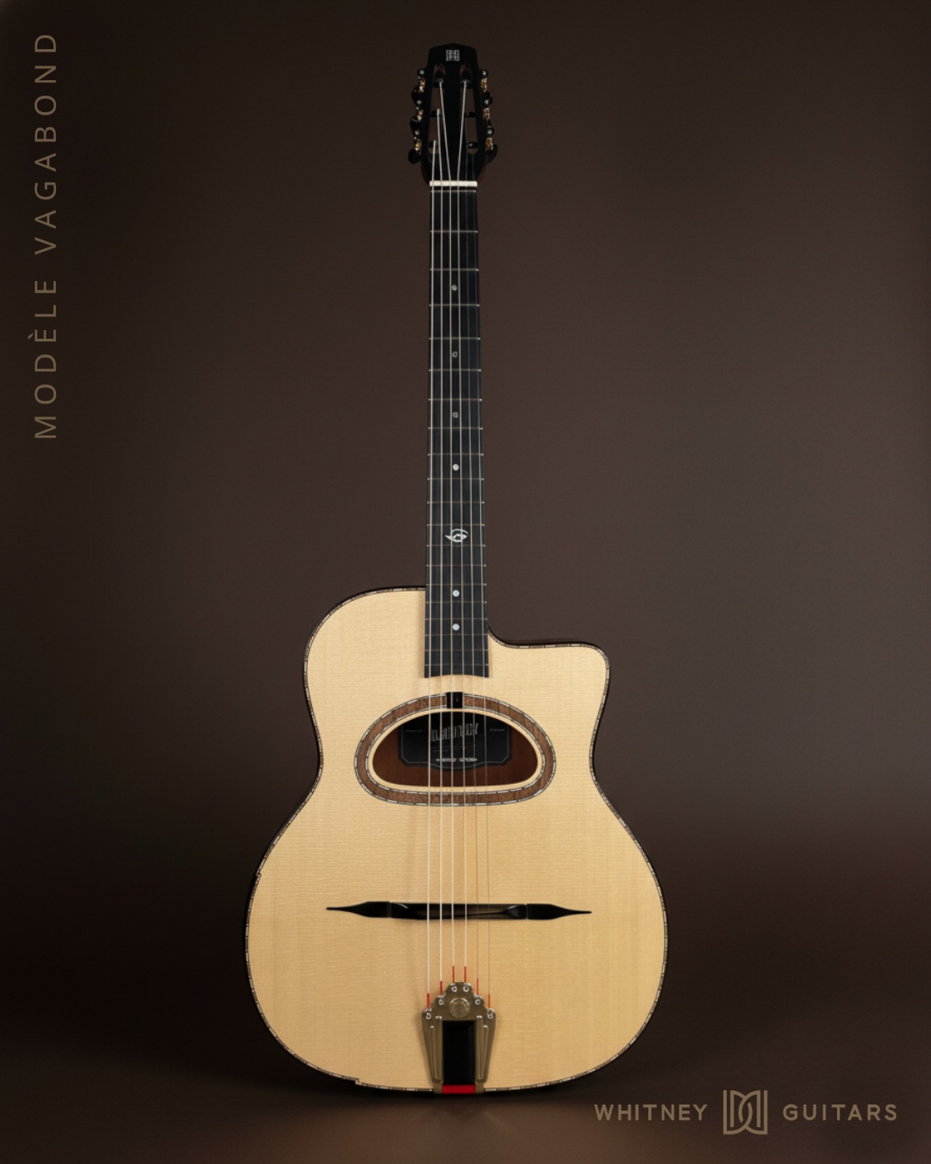 A New Modèle Vagabond (for Ron).
This one pairs a Sitka spruce top with flamed walnut back and sides, but the details are what make the build feel complete: a custom purfling motif carried from the rosette through the body, a matching walnut rosette, a small arm bevel for comfort, and a custom rosette pendant to tie the design together.
A tasteful mix of lines, textures, and materials that ended up working really naturally on this model.