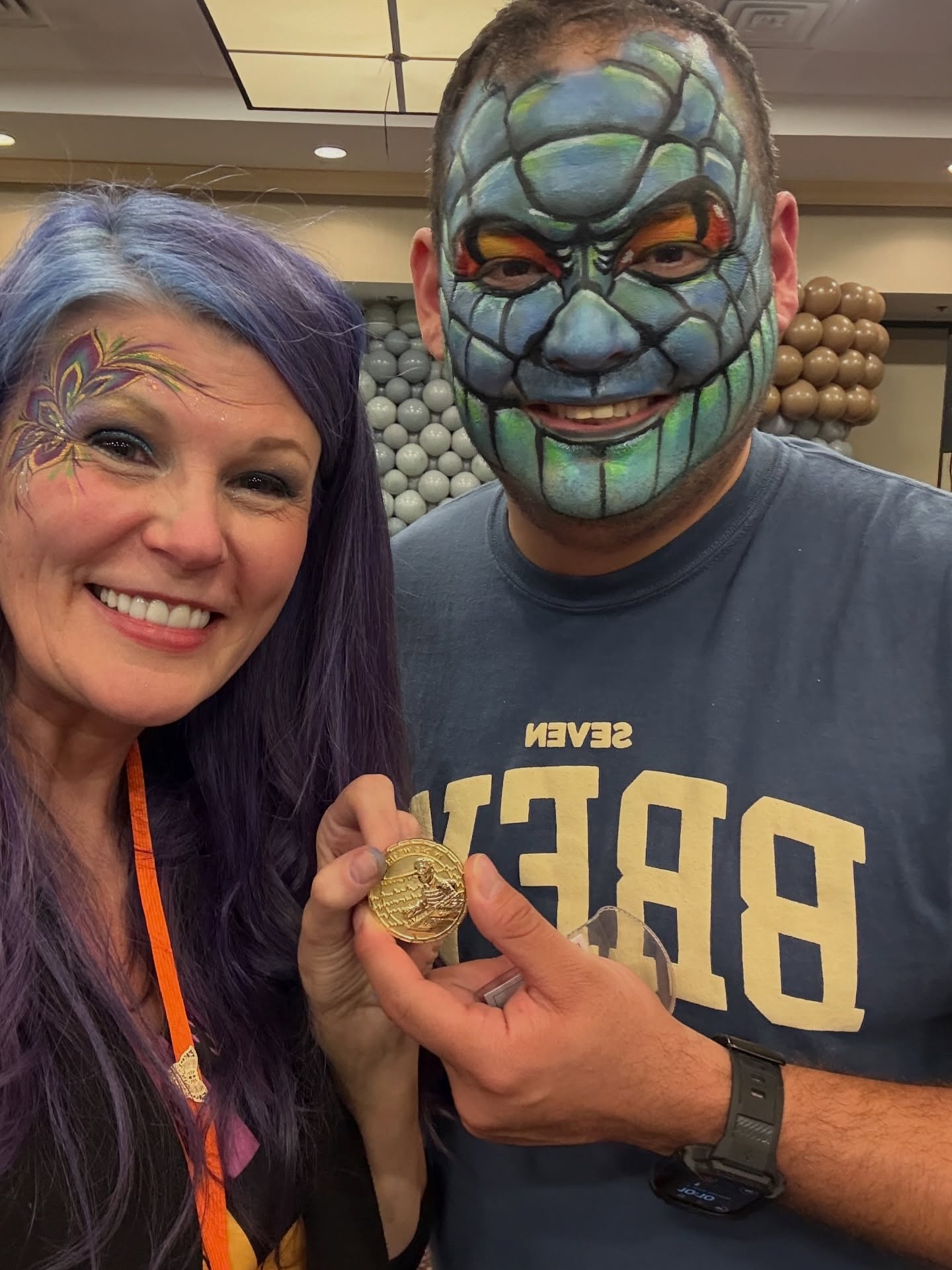 At the conference, I had the opportunity to practice the head of my body piece on a police officer. There was a polygraph class happening that same week and they were in the hotel. So- this very accommodating officer let me paint him (he also practiced balloon twisting and enjoyed the fun we were having!) and afterwards- he COINED me! If you’re familiar with the concept, you know it’s an honor!!! I come from a military town and getting coined was super high praise and RARE!!!
Keep fighting the good fight PD!!!
#coined #thankful