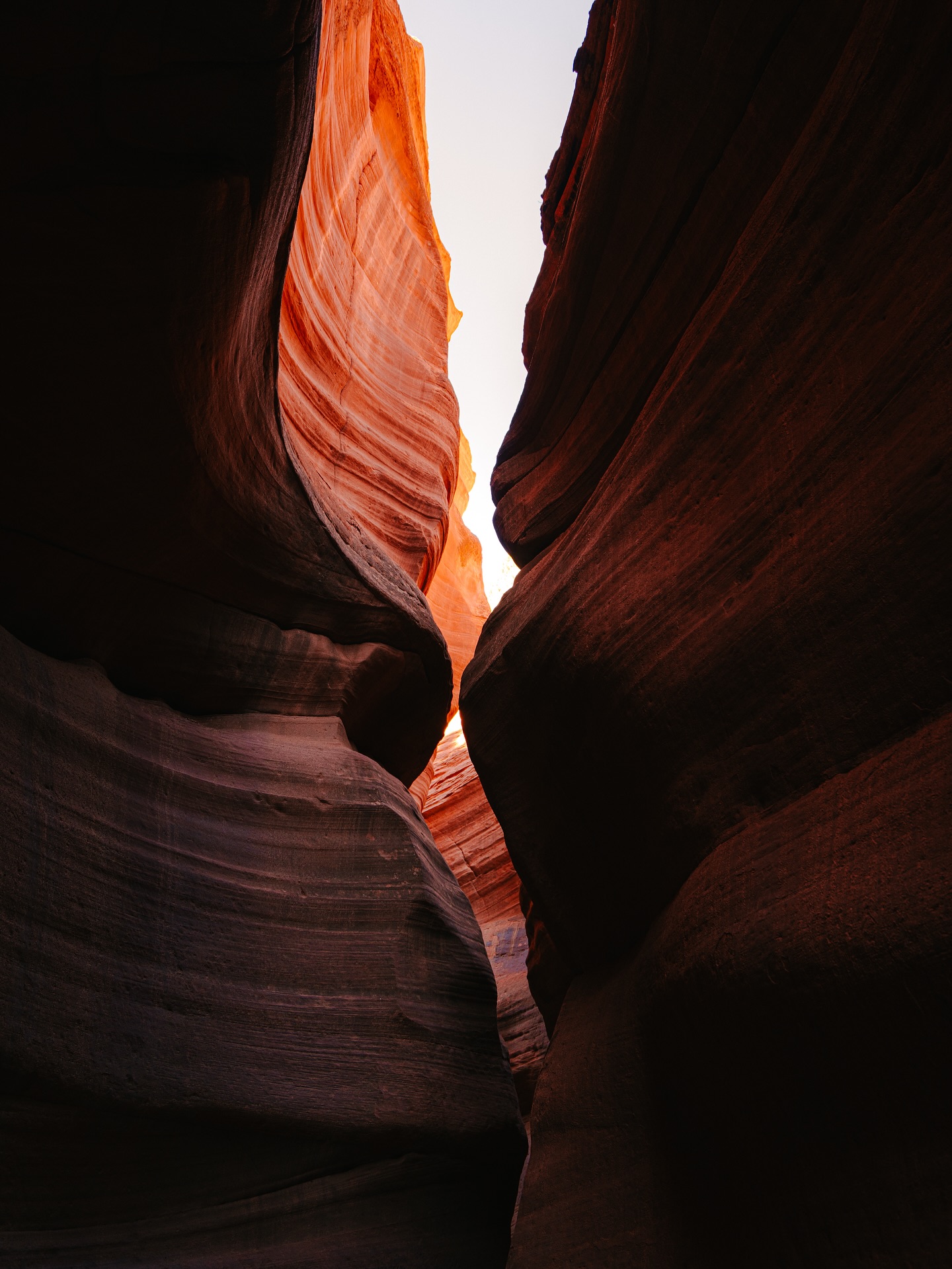 Slot canyons have such a unique feeling. Especially when you have it to yourself. You can hear the wind blowing through, the change in temperatures, and the stillness. These canyons have been carved with wind and water over long periods of time, which is what causes the striping on the walls.