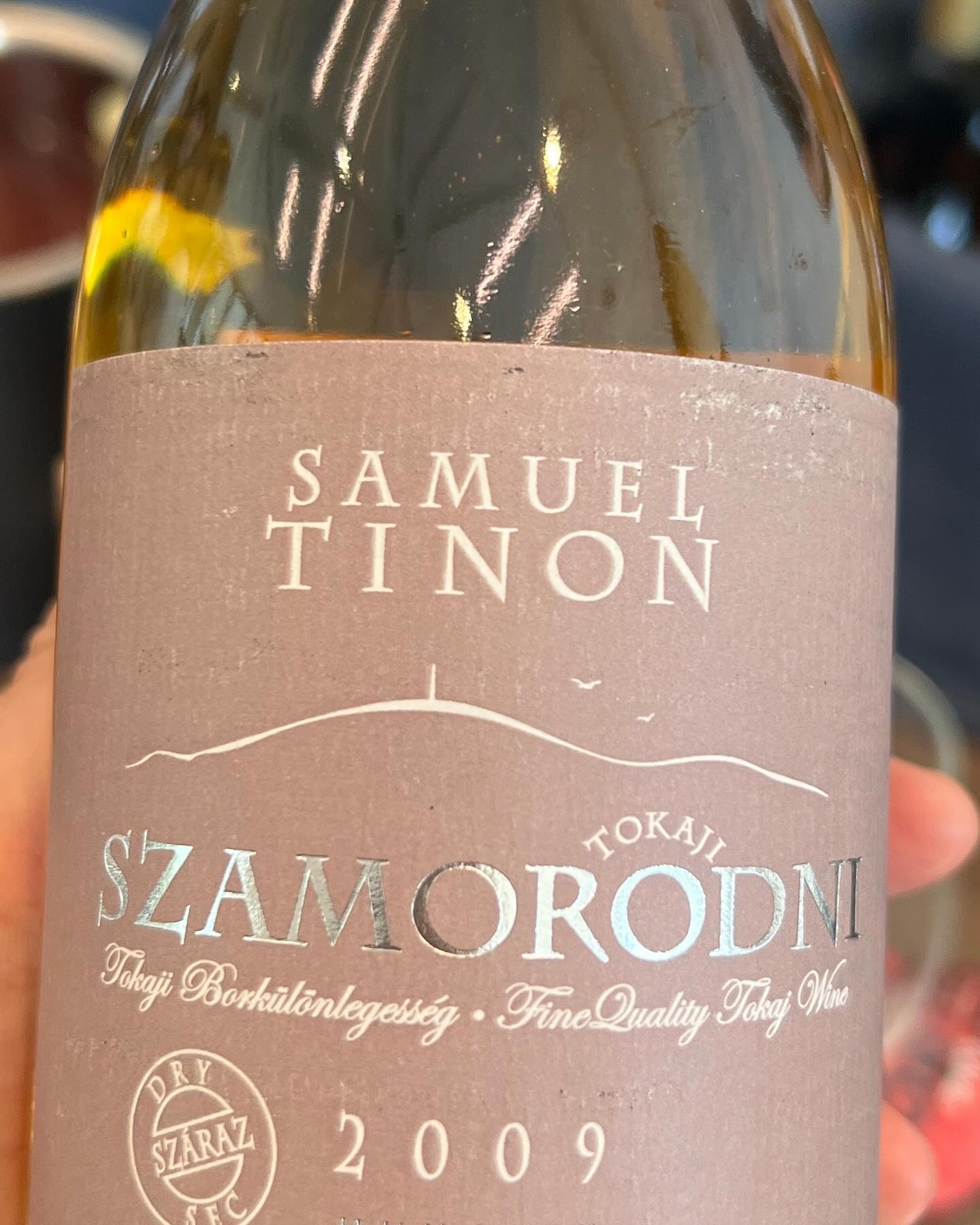 Szamorodni is a lovely Hungarian word that means 'as it comes' - a great philosophy in life. It is also a word for one of the rarest wines produced in Tokaji. While Tokaji Aszu, a beautiful wine made from Aszu berries (grapes whose sugars, acids and flavors are concentrated by botrytis fungus) that turns Furmint and Harzelevlu into sweet nectar of the gods, is not hard to find in the US, and dry, stony, single varietal Furmints are trending in wine bars, Szamorodni is a rare find in the US -- and a wine I have been dreaming about ever since I was assigned Tokaji as my teaching demo for my WSET educator certification. Why is this wine so special? Because the berries are harvested ‘as they come’ which means they probably have a combination of desiccated grapes and grapes unimpacted by botrytis. Then, depending on the levels of sweetness in the grapes, they are vinified into a dry or sweet wine The delicate sweet version, or édes, combines the spark and clarity of fresh grapes with the depth of flavor that comes from the botrytized berries – and, today, is usually aged without oxidation (which was the traditional technique) to preserve freshness and aromatics. But, it is the dry or száraz version that is the rarest and most intriguing because the wine from these ‘as it comes’ berries is aged under a velo de flor (a veil of yeast), the same method that gives many Sherries their unique, briny quality. Száraz Szamarodni is unlike anything I have tasted, bringing together the captivating honey of noble rot, orange peel and dried flowers, and a touch of doughy salinity from the flor - all in perfect balance. At the recent @wines.of.hungary tasting in LA, I experienced, for the first time, two Édes and two Száraz, and they were fabulous ... but, sadly, almost impossible to source here in the US. These wines, along with others I tasted at the event, from classicTokaji Aszu to fragrant single varietal Harselevelu and volcanic Furmint, to the minerally Juhfark (means sheep’s tail) to the red, pinot-like Kadarka and more, prove that although 'Bor' is the Hungarian word for wine - these wines are decidedly NOT boring! @wines.of.hungary #szamorodni #tokaji #bor