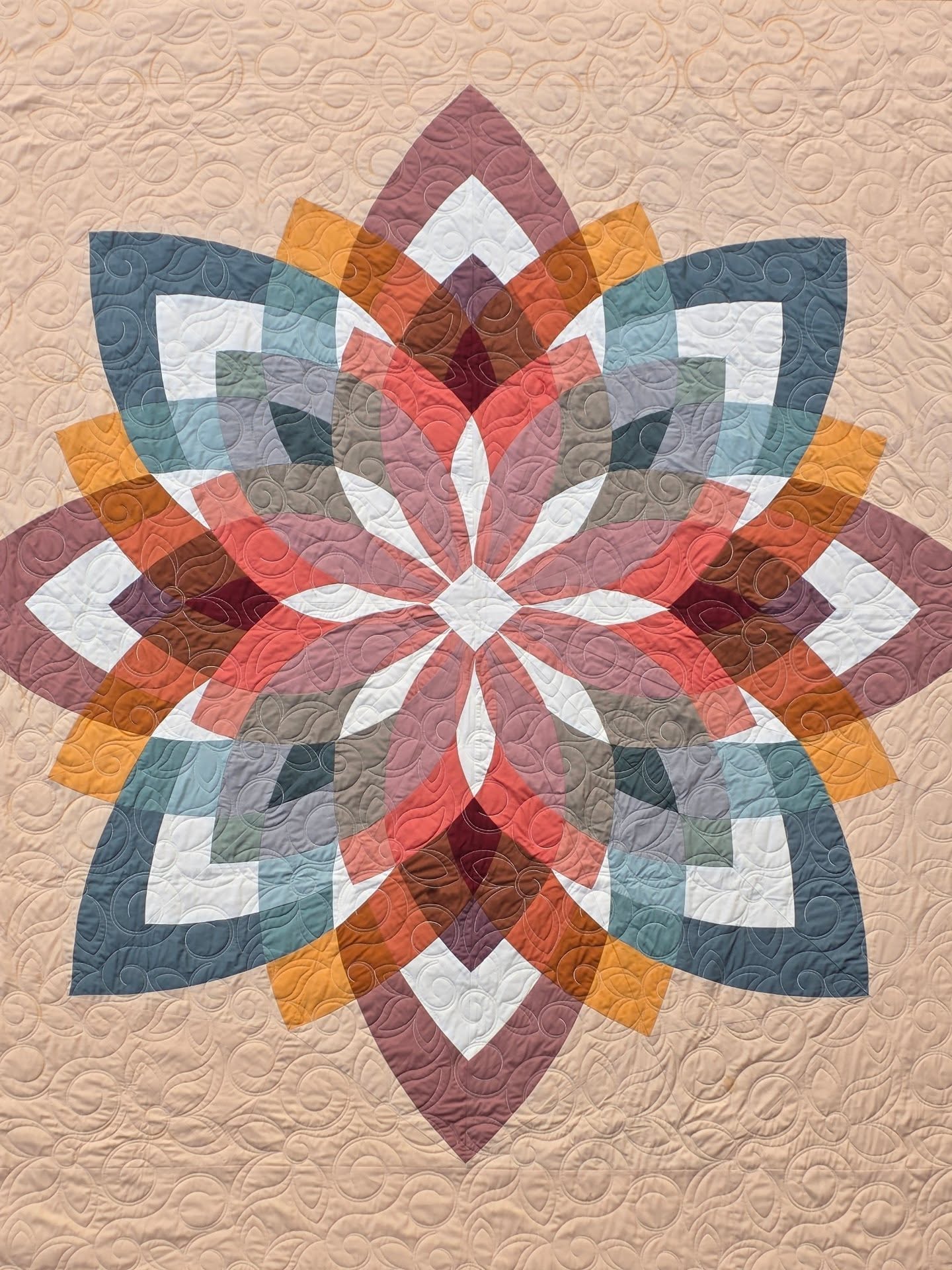 This quilt was a lesson in persistence.
I started it last September, put it away for a bit, picked it back up this summer, and finally finished it not too long ago.
I really didn't know if it would all come together correctly until the final seams, but magically everything worked out, and I'm very pleased with the outcome!
I'm not sure if I'll write a pattern for this one. There was a lot of sweet talking a seam here and bribing a seam there and I'm just not sure how well that would translate into a pattern 😉 so this specific one might just be one and done. I did love this process though, so maybe I'll keep exploring this method and write up a pattern for something in a similar style in the future. We shall see.
And a huge shout out to Shasta @favoritedayquilting for the ✨️beautiful✨️ job she did longarming!
Pattern: original design by me, no current plans for a pattern
Fabrics: @artgalleryfabrics #agfpuresolids and @pbsfabrics
Longarming: Shasta @favoritedayquilting using the Lace Leaf pantograph by @my_creative_stitches
#modernquilting #curvequilt #geometricquilt #pnwmaker #pnwquilter #oregonmaker #oregonquilter #eugenemaker #eugenequilter #heckyespatterns #heckyessewco