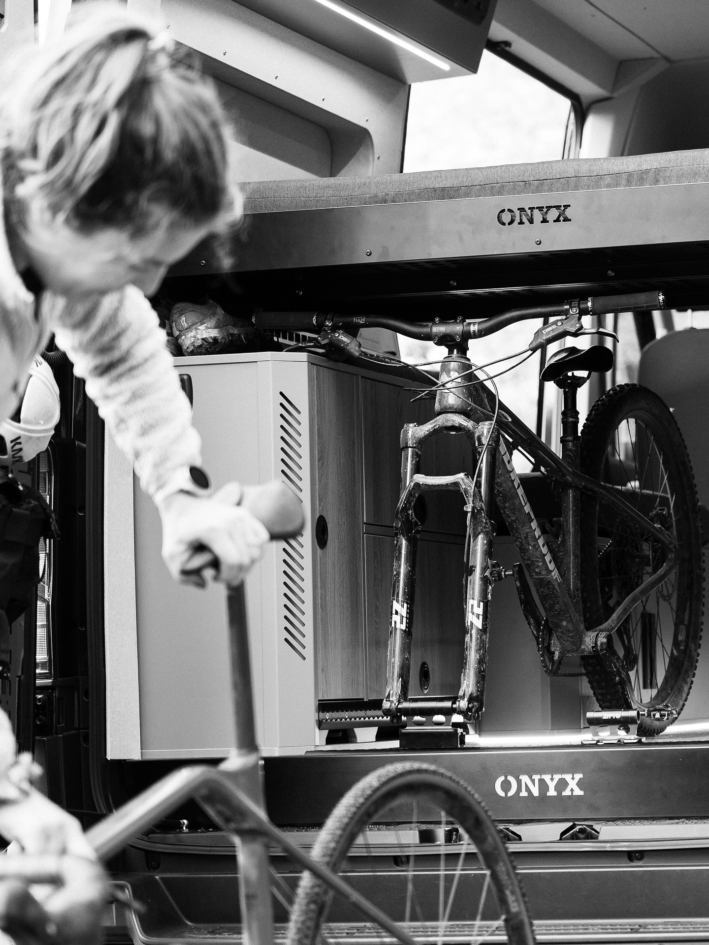 Can I fit my bike in?
We get this question a lot — and as three cyclists ourselves, we get it. Being able to bring your bikes and store them securely inside the van matters. That’s why our garage is designed around exactly that.
Here’s how we make it easy:
• Our bed system sits high enough to slide bikes underneath
• Space above the garage cupboards accommodates wide handlebars
• Optional L-track or a bike tray for secure mounting
• Plenty of rear storage for helmets, shoes, and kit
• A rear wash-down point for muddy people, dogs, and gear
We build vans to help you get out and do more of what you love.
#onyxvans #onyxvansuk #adventurevan #adventurevans #campervanconversion #campervanlife #offgridvan #offgridadventures #mantge4x4 #sprintervanconversion #vanconversionuk #bikepackinglife #bikevan #cyclingadventures #gravelcycling #mtblife #campervansofinstagram #vanlifemovement #vanlifersuk #exploremore #getoutside #builtforadventure #vanbuilduk #campervansuk #vaninteriordesign