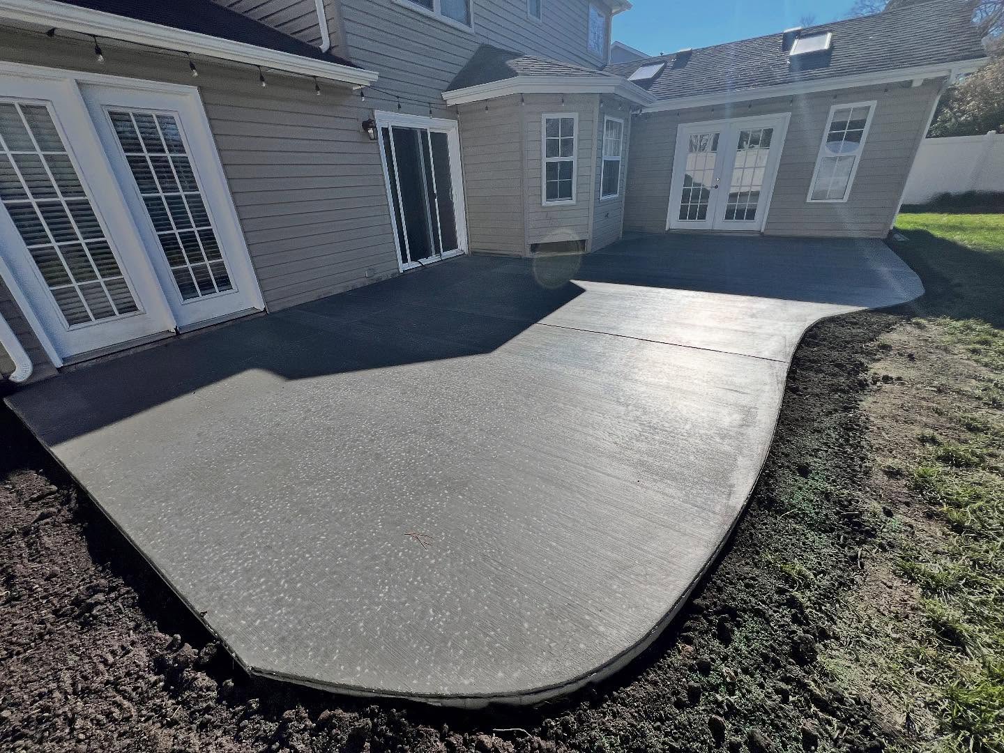 Just wrapped up this stunning #outdoor #concrete #patio for our amazing client! 🌟 Transformed their backyard into the ultimate chill spot for BBQs and sunsets. Who’s ready for their dream outdoor upgrade? DM us to get started! #TurfsUpContracting.com #ConcretePatio #OutdoorLiving #BackyardGoals