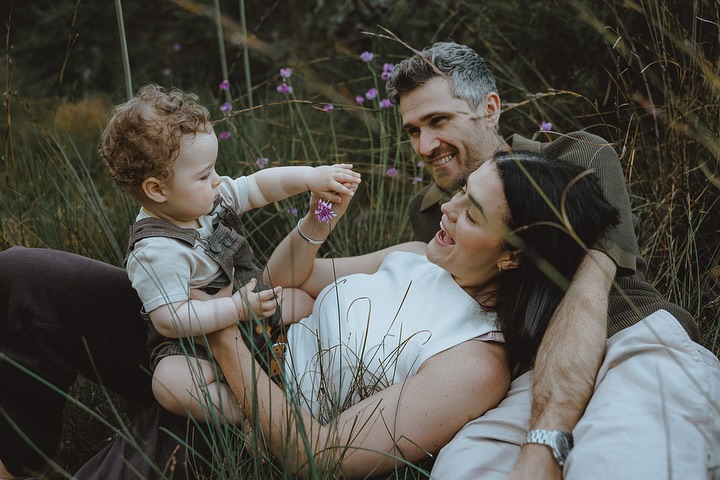 You don’t realise it while it’s happening…
but these early days become the stories you tell forever.
A warm patch of grass, a sunset, a six-month-old giggle —
and the feeling of your whole world right there in your arms.