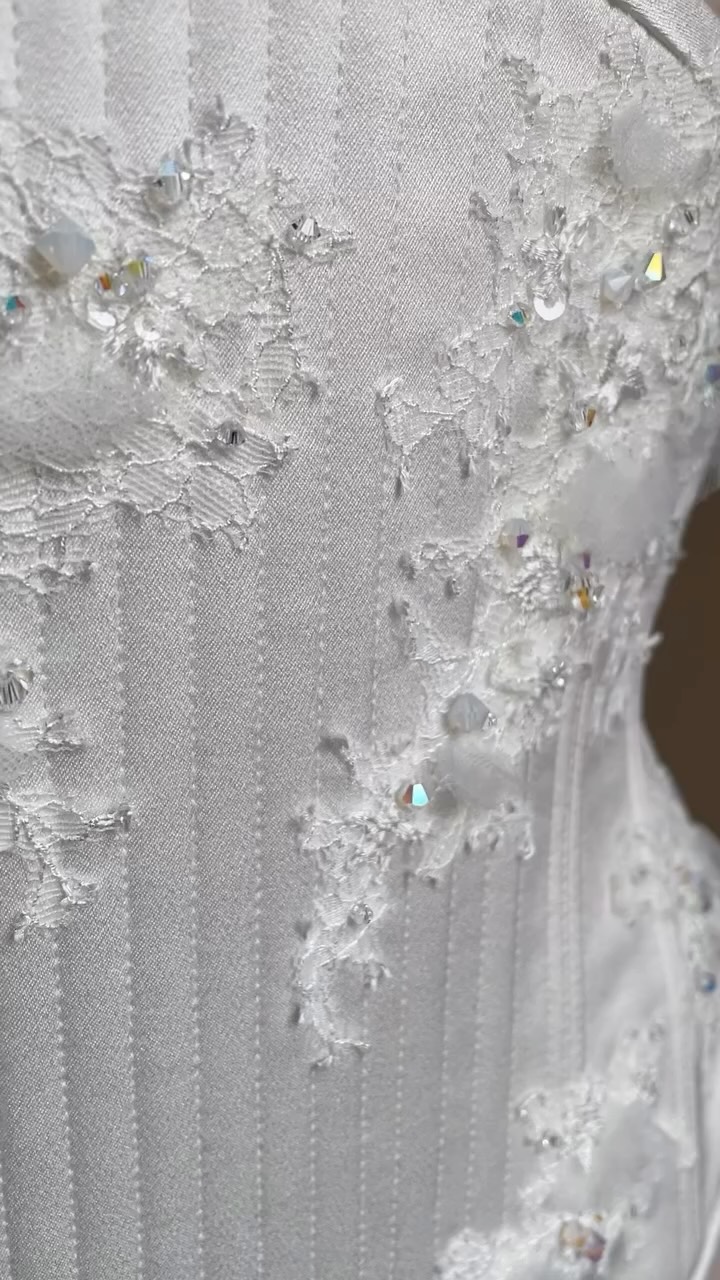• Cassie •
A corset for the bride who dreamed amongst the stars.
This ivory underbust, inspired by celestial reverie and the quiet magic of moonlight, became a luminous canvas where texture and starlight entwined.
Delicate lace and soft tufts of tulle were layered to create depth and dimension, while embroidered moons and stars traced gentle constellations across the surface. Crystals were artfully scattered, catching the light with every movement and shimmering like fragments of the night sky draped across the form.
#EmiahCouture #Emiah_Bespoke #Emiah_Bridal #Emiah_Bride
