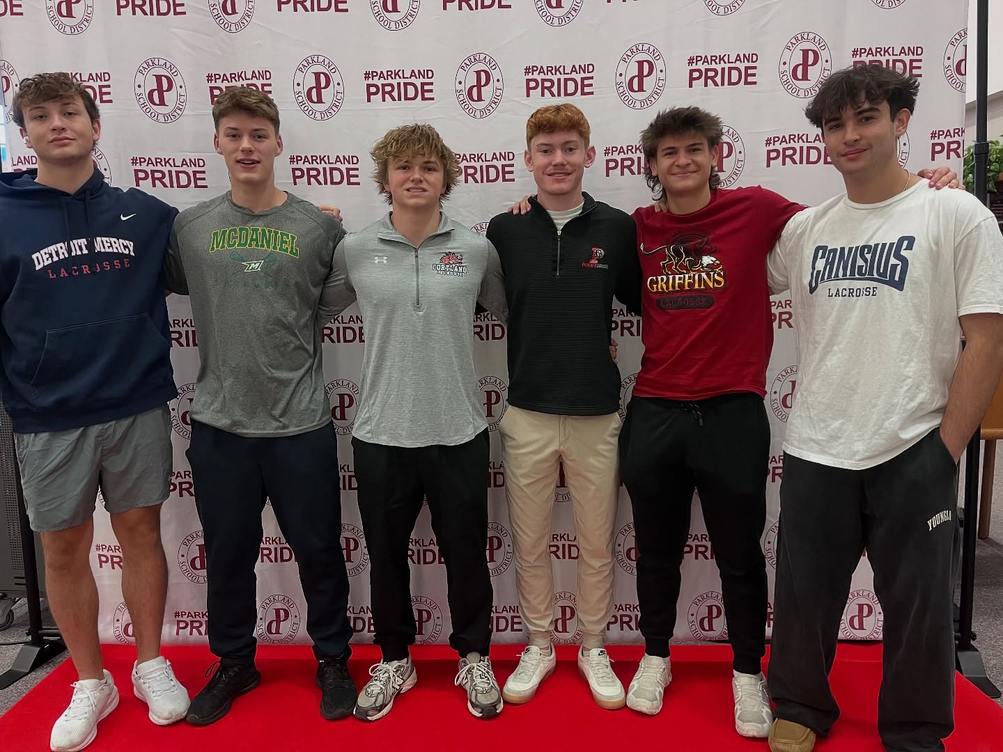 🎉🥍 Commitment Day Congratulations!
A massive congratulations to our seven incredible Parkland Boys Lacrosse players who officially signed their National Letter of Intent commitment letters this week!
Your hard work, dedication, and unwavering commitment to the sport have paid off in a major way. We are so proud to celebrate this momentous milestone with you!
This is a testament to the countless hours you’ve spent on the field, in the weight room, and in the classroom. We can’t wait to follow your collegiate careers!
✍️ Signed and Committed
(Pictured Left to Right)
• Matt Kelley - University of Detroit Mercy
• Colin Winfield - McDaniel College
• Rob Gerdes - SUNY Cortland
• John Gerancher - University of Lynchburg
• Owen Fehnel - Gwynedd Mercy University
• Danny Tapia - Canisius University
(Not Pictured)
• Drew Shaffer - Muhlenberg College
Go Trojans!
#NationalSigningDay #NLIDay #CollegeBound #parklandtrojans #parklandpride