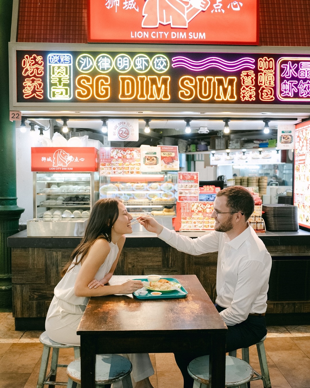 Wandering the streets of downtown Singapore, documenting the city that was their first home together 🏮