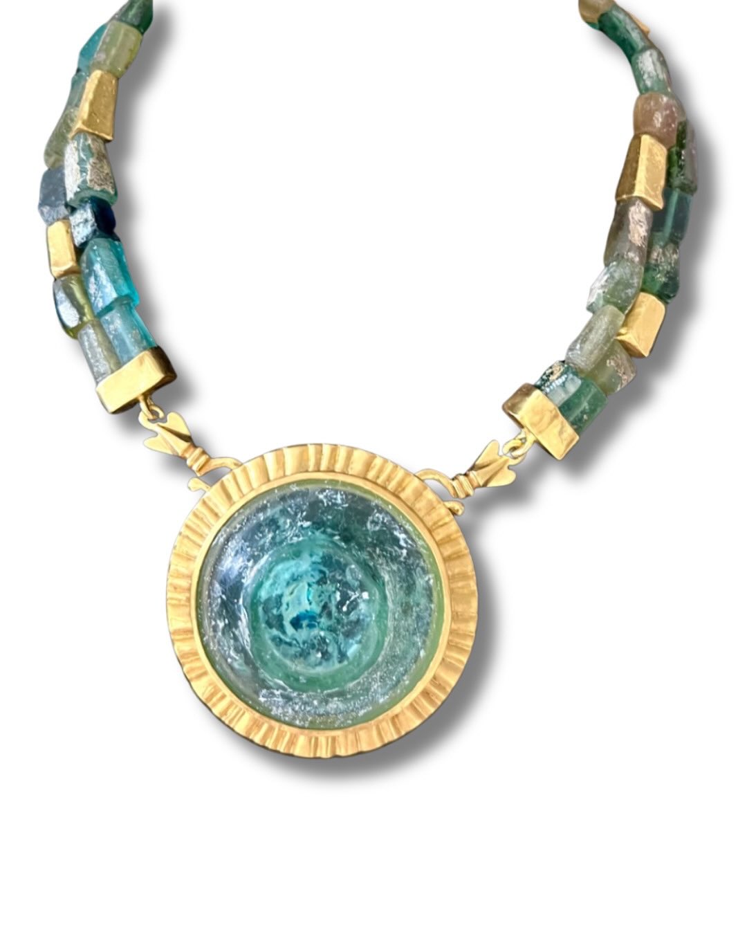 This extraordinary one-of-kind necklace, handcrafted by Patricia Kolodny, is making its debut today at Selima Optique for NYC Jewelry Week! It’s created using ancient Roman Glass found in Israel and handmade 22k heavy gold beads.
✨
A true piece of art and adornment, this necklace will be the showstopper at your next seaside retreat. The ancient roman glass is a beautiful sea foam green accented with rich 22k yellow gold.
✨
Meet Patrica at our show during @nycjewelryweek !
✨
Scroll ➡️ for event details.
✨
Discover Patti’s full collection only during @nycjewelryweek , Nov. 17-21, hosted by @space85jewelry at Selima Optique located at 7 Bond. St. NYC. @bond07byselima
✨
Event Details:
📍 Selima Optique, 7 Bond St., NYC
🗓 Dates: November 17-21, 11-7 pm
🍾 Reception: November 19, 4-7 pm
.
.
.
.
.
#space85jewelry #selimaoptique #nycjw #ancientegyptinspired #ancientromanglass #romanglassjewelry #22kgold #handcraftedfinejewelry #handcraftedinnewyork