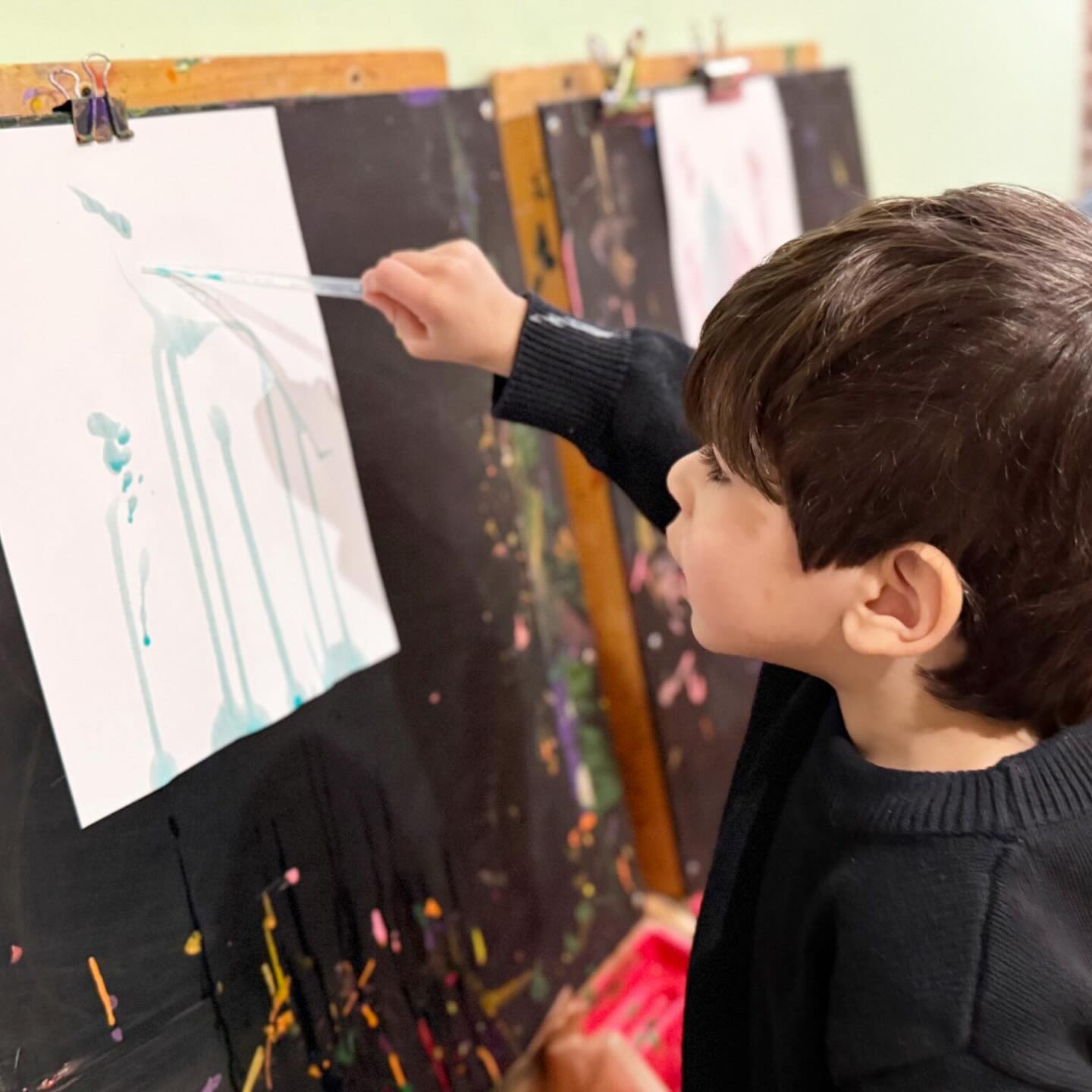 Each day, our classroom teachers post a daily blog with photos and descriptions of their day. Here is an excerpt from the Green Room blog:
“During free choice time, the children explored with droppers and liquid paints to create beautiful masterpieces. Some friends said their paper looked like it was crying, while others thought it looked like the beach. One friend said their creation was the sky. It is always so interesting to see how each child brings their own story, imagination, and interpretation to their art.“ —Ms. Jeana💚