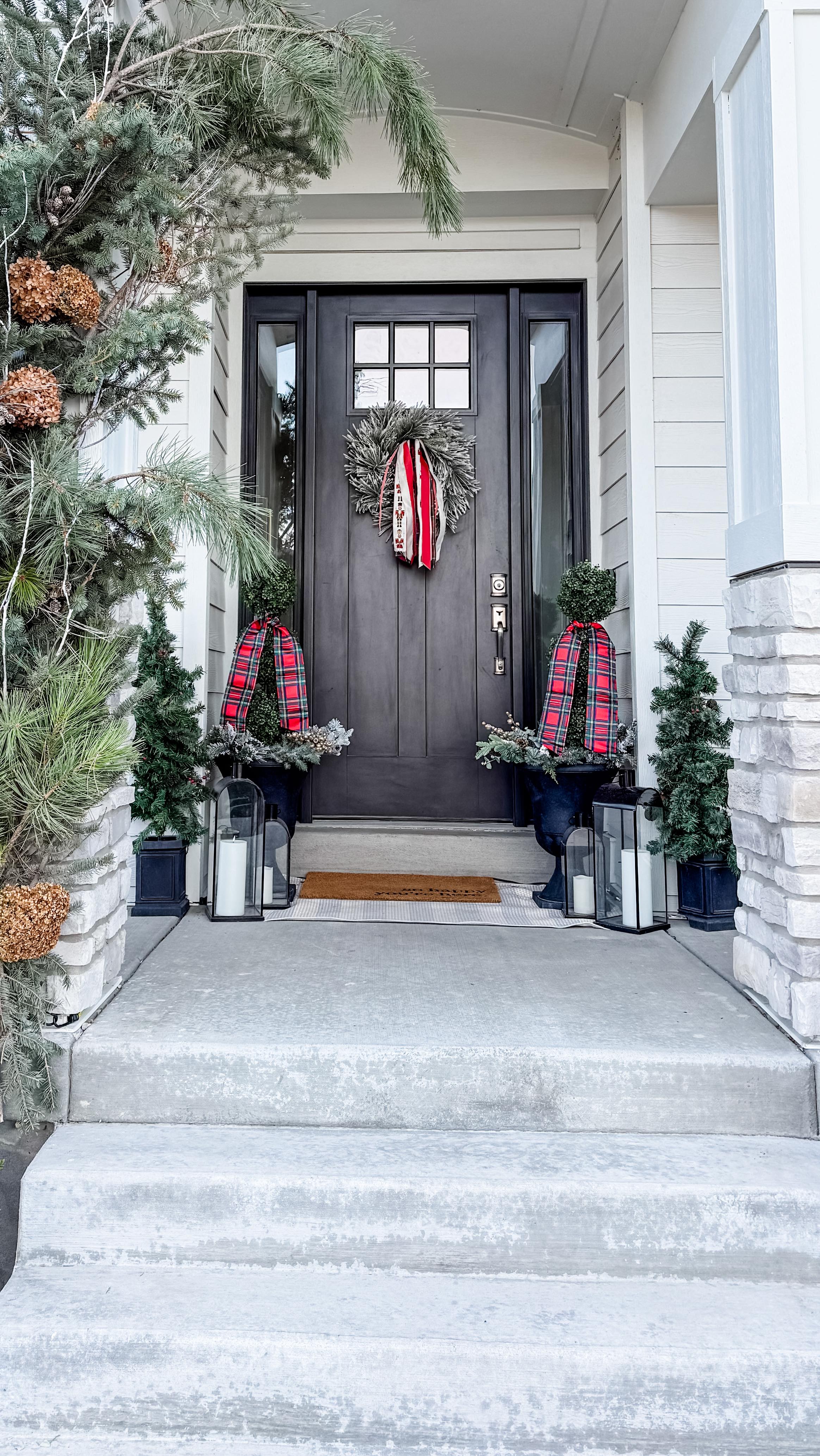 This season I wanted the front entry to feel quietly magical—so I created a natural pine statement piece right along our walkway.
I layered fresh pine branches with dried hydrangeas and other foraged elements to bring in that soft, organic texture I love. Then I paired everything with classic plaid and nutcracker ribbon for a touch of holiday charm.
Lanterns, small trees, and warm glow added the ambience… and suddenly the whole walkway feels like an inviting little moment leading you home.
Sometimes the simplest, most natural elements make the biggest impact.
#christmas #christmasmagic #christmasdecor #christmasvibes #christmasmood #christmasdecoration #christmasdecorating #christmasphotoshoot #christmasphotos