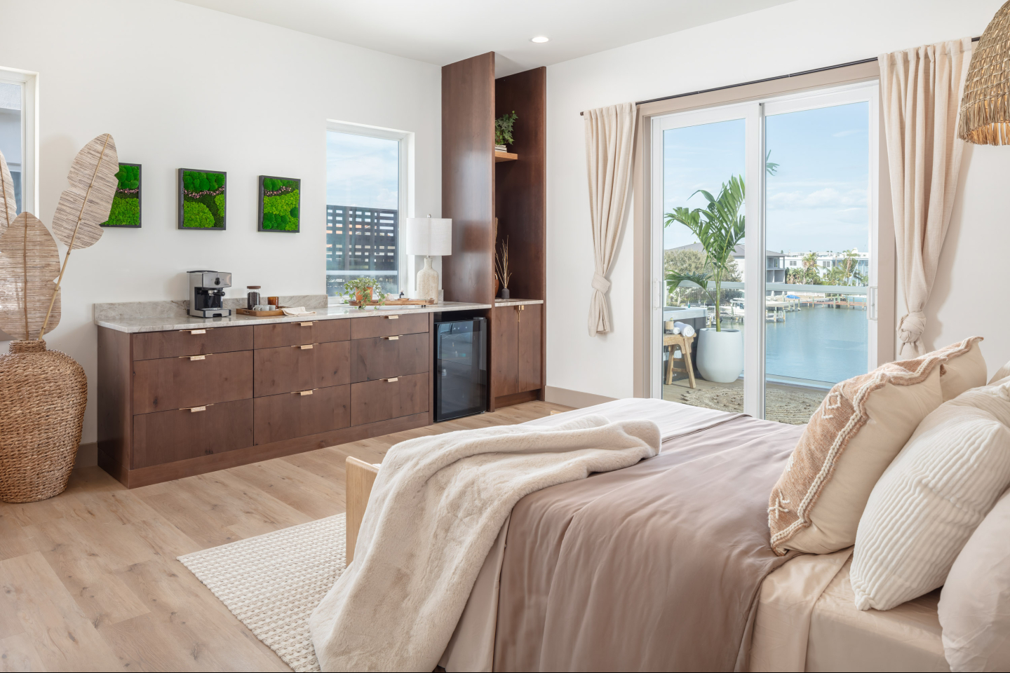 This space combines warm materials, custom millwork, and soft natural light to create a retreat that feels calm, comfortable, and connected to the outdoors. The large sliding doors open to waterfront views, bringing in daylight and extending the room beyond its walls.
From integrated storage to a built-in beverage nook, every detail is designed to support easy, elegant living.
Homes feel different when the architecture works for you.
If you are planning a project for the new year, we would love to help bring your vision to life.
#LuttrellArchitecture #Architecture #InteriorArchitecture #HomeDesign #ModernDesign #NaturalLight #CustomHomes #TampaDesign #ResidentialDesign