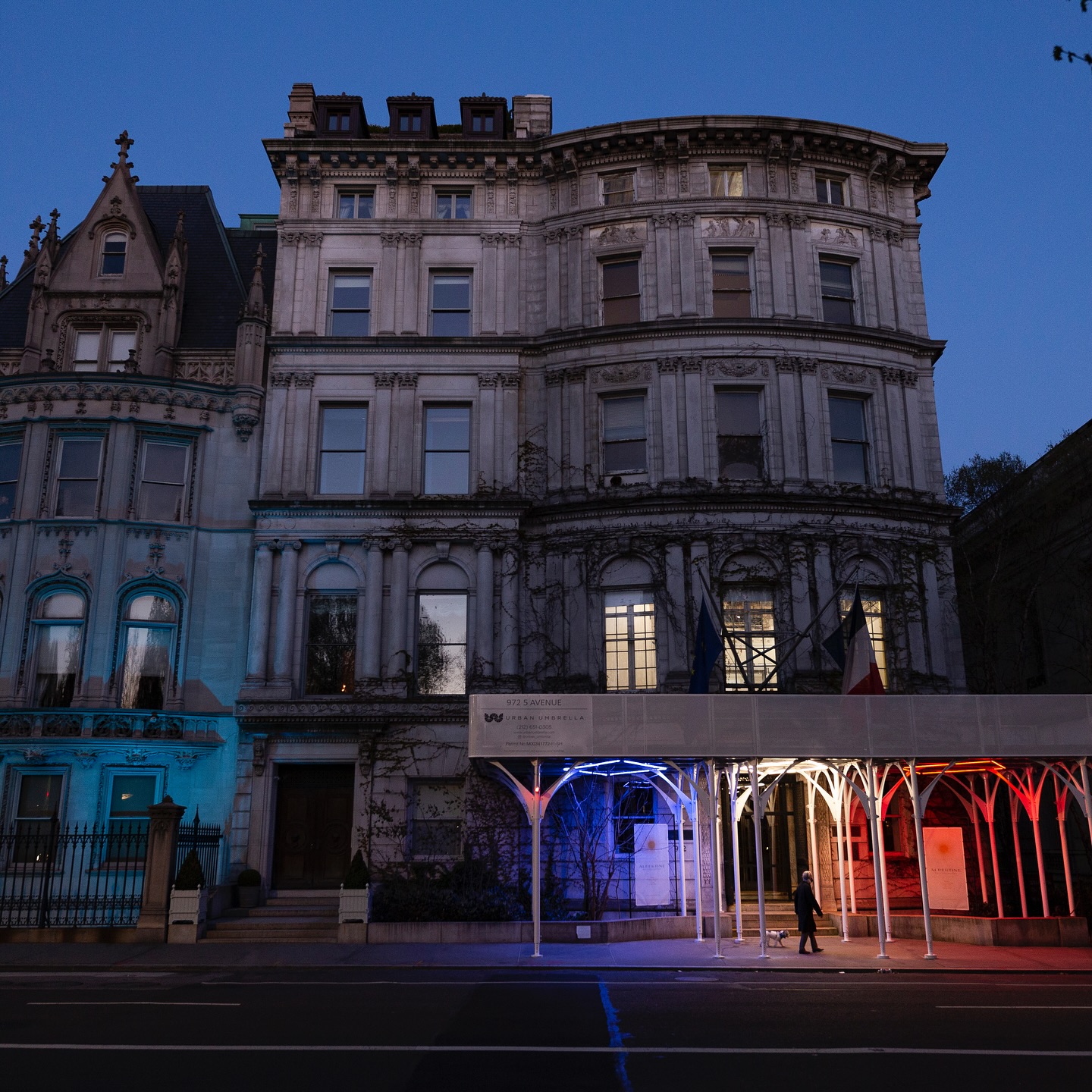 Urban Umbrella was proud to partner on this installation for the French Embassy Department of Cultural Services in Manhattan, creating a custom system that complemented the embassy’s historic architecture while ensuring the highest level of pedestrian safety.
Our signature white steel structure and translucent canopy provide durability, light, and elegance, preserving visibility of the facade both day and night. To honor the embassy, the lighting was custom-designed in the colors of the French flag, adding a striking and symbolic touch to this landmark project.