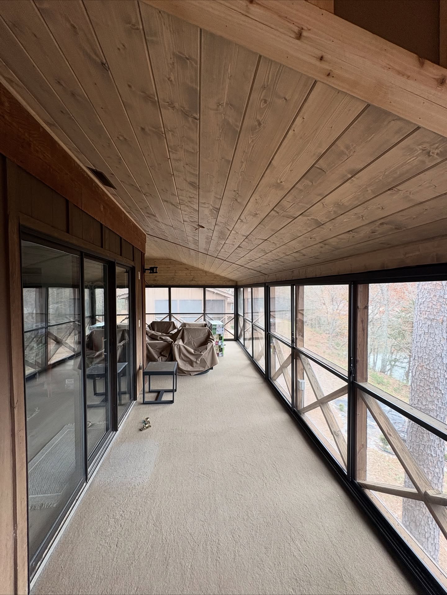 Our team completed a tongue and groove installation on our newly built 14-foot deck bump-out and back patio area. The stained tongue and groove has updated the space and provides an inviting atmosphere.