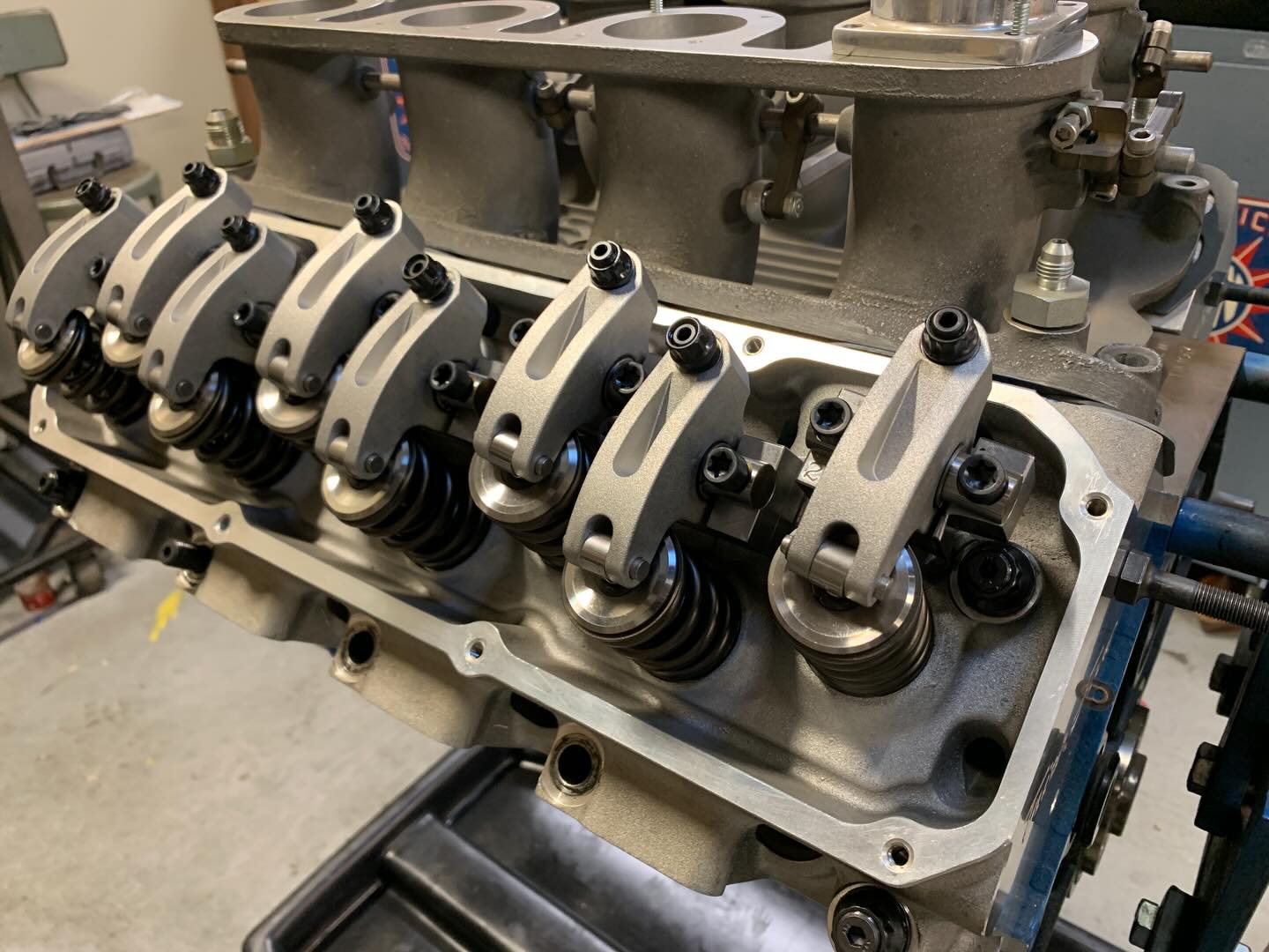 Finally getting around to spend some time on this build. Spent more time than I was expecting to get these rocker arms to the point they could be mounted. I also wrapped up mods to the heads to accept the 11/16 dia pushrods from @manton_pushrods .