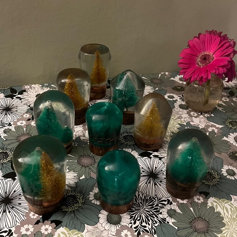 Christmas decorations for the festive season! Sparkly green-and-gold trees with a classy, cosy vibe.