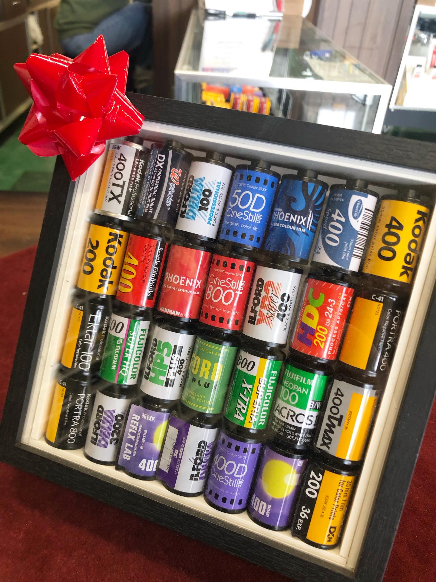 Fun Film Frames, a fun gift for your film photography phriends. Choose from pre-made film canisters or customize with your favorite films. #camerastore #filmpgotography #35mmfilm #ishootfilm #ilfordfilm #kodakfilm #cinestillfilm