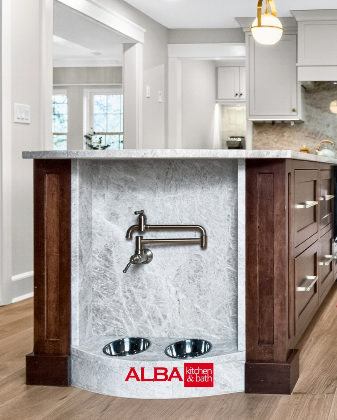 In our recent kitchen project, we designed a built-in pet feeding spot by the island. You can see more pet-friendly designs at our showrooms. #petfriendly #kitchenisland #luxurykitchen #dogfeed #kitchencabinets Photos & Videos: Celine & John