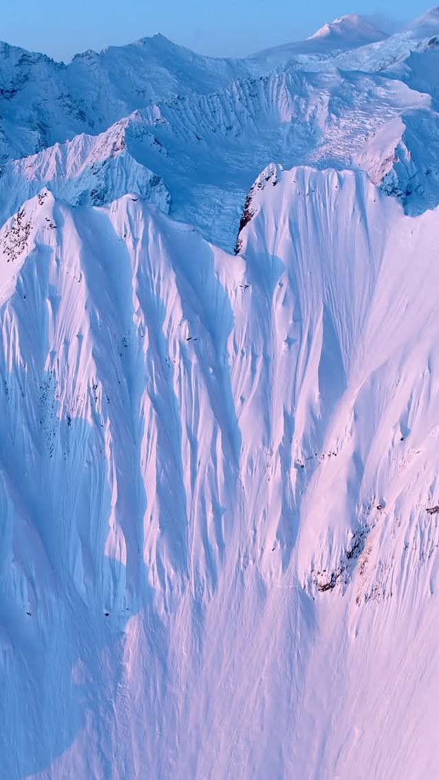 Waking up before sunrise, even when it’s hovering in the -20 Cs, to start an ascent in the dark is always worth it, especially when you get to watch the sun rise from the ridgeline. We named this objective the Burrito Bowl because the spines reminded us of a stack of Mexican wraps. This was the most exposed zone we tackled on our trip to the Tordrillos. Because of that we rode it last, partly so we could warm up on easier lines and assess snow stability & the other part so there’d be enough sun on the lines. The face caught the first kiss of day and the last glow at sunset.
It was motivating to see @griffpost & @johncollinson charging their lines with unwavering confidence. Nothing quite beats watching your friends absolutely crush it. Vibes were high! This trip was a memorable one, and I’m grateful for the adventure with @aharonbramvideo , Johnny, and Griff in the mountains!
#NeverStopExploring