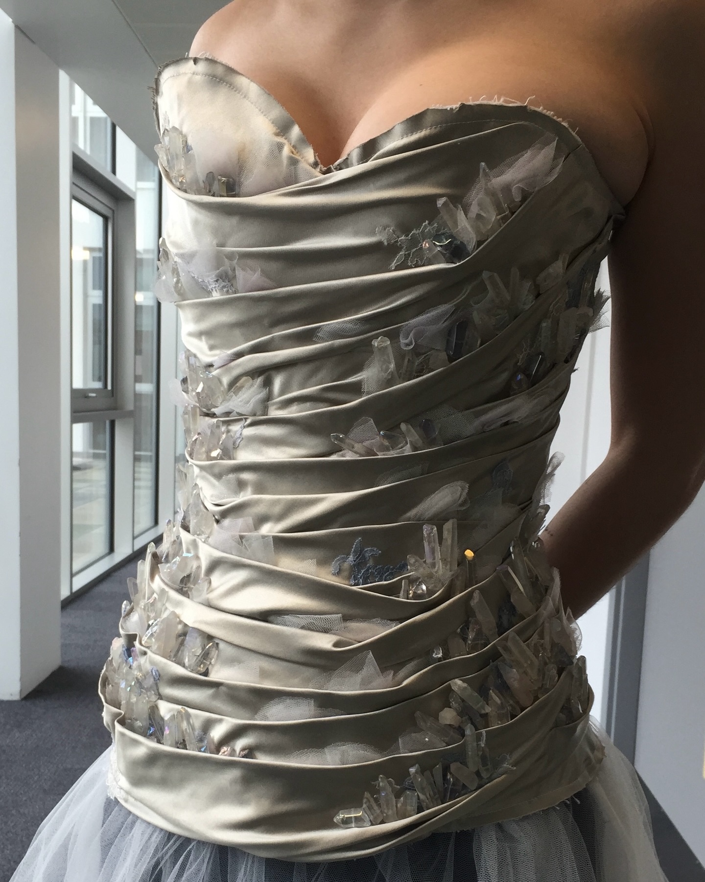 • Effie •
This corset began with pure movement, first draped on a mannequin, then refined directly on the body, allowing gravity and gesture to guide each fold. I shaped the fabric as though I was sculpting a current of water, letting the form reveal where it wanted to fall.
The embellishment was placed last, nestled into the draping as though crystallizing in real time, showing peeks of glimmer.
It was a process of listening to the materials and letting using my instincts dictate where every elements would settle for a balanced organic effect
#EmiahCouture #Emiah_TSW #Effie_TSW #Emiah_Effie