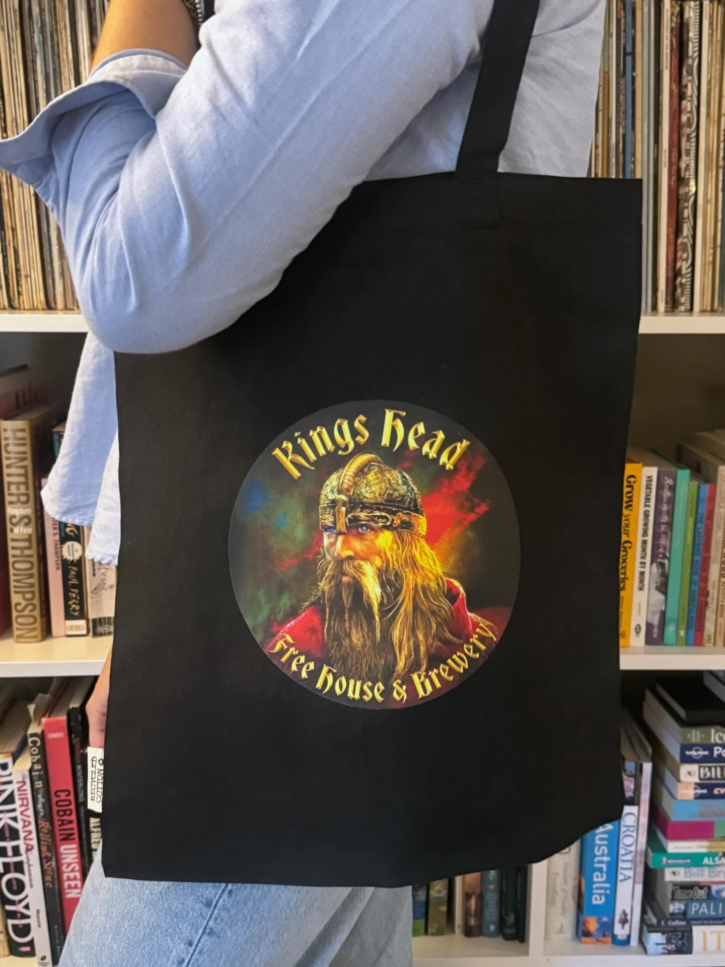 Hot off the press! Kings Head tote bags adorned with our King Bildr. We are so proud of our Kings Head logo created by artist to some of the world’s biggest names in rock music @masquestudio , it was a huge honour to have Mark Wilkinson create this majestic King for us. Our bags will be available at our Christmas Night Market on Friday the 5th December along with T-shirts and wine gift boxes from @mayflywine and @noteswineandmusic - our Night Market is free entry and it’s free to have a stall (only a few more pitches left, so please get in touch if you’d like a stall). We’ll have live Irish folk music, bratwursts, steins of beer and stalls full of goodies to peruse! Let’s buy independent and local this Christmas! #supportlocal #buyindependent #christmasmarket