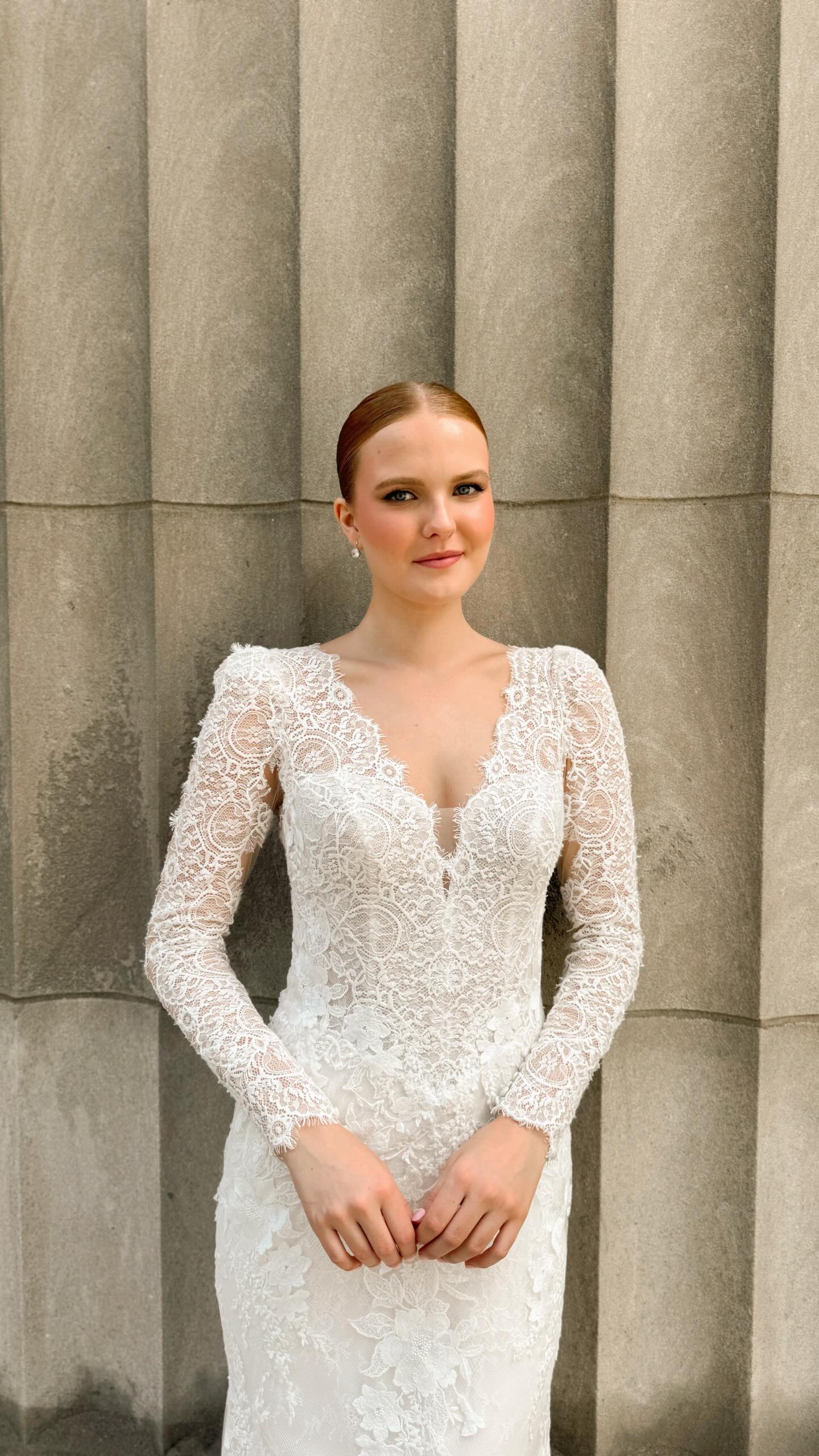 ❄️ Winter brides, this one’s for you ❄️
If “main character in a snow-dusted fairytale” is your wedding aesthetic, consider this your sign. Long lace sleeves for cozy romance, a little sparkle of vintage charm, and a mermaid silhouette that brings the WOW!
Noella I S2611