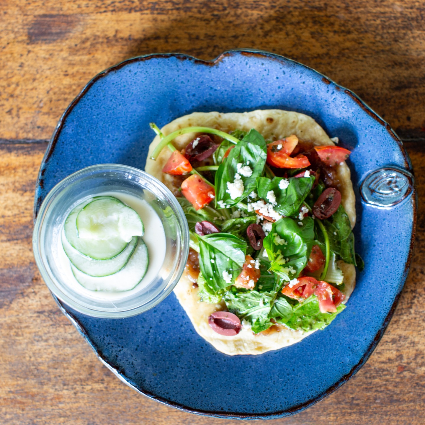 A refreshing lunch on a hot summer day.
Homemade naan bread pita using our own freshly made yogurt with fresh loacally grown arugula, basil, and tomatoes atop a bed of mango-marañon curaçao chutney. Topped with an organic cilantro lime vinagrette and freshly made goat cheese from our local artisans. Served with a fresh raita cucumber salad.
#Morrillo #AdventureTraveler #AdventurePanama #Locavore
#FarmToTable #SupportLocal #SustainableLiving
#SustainableTravels #SurfingLife #FamilyTravelAdventures #FamilyTravelMoments #RegenerativeTravel #RegenerativeTourism
#FamilyTravelIdeas #FamilyTravelAdventure #FamilyTravelTime
#AdventureFamilyTravel #AdventureTravelFamily
#AdventureTravelers #AdventureTraveller #AdventureTraveling
#FemaleSurf #WomenInSurfing @earthbornpottery