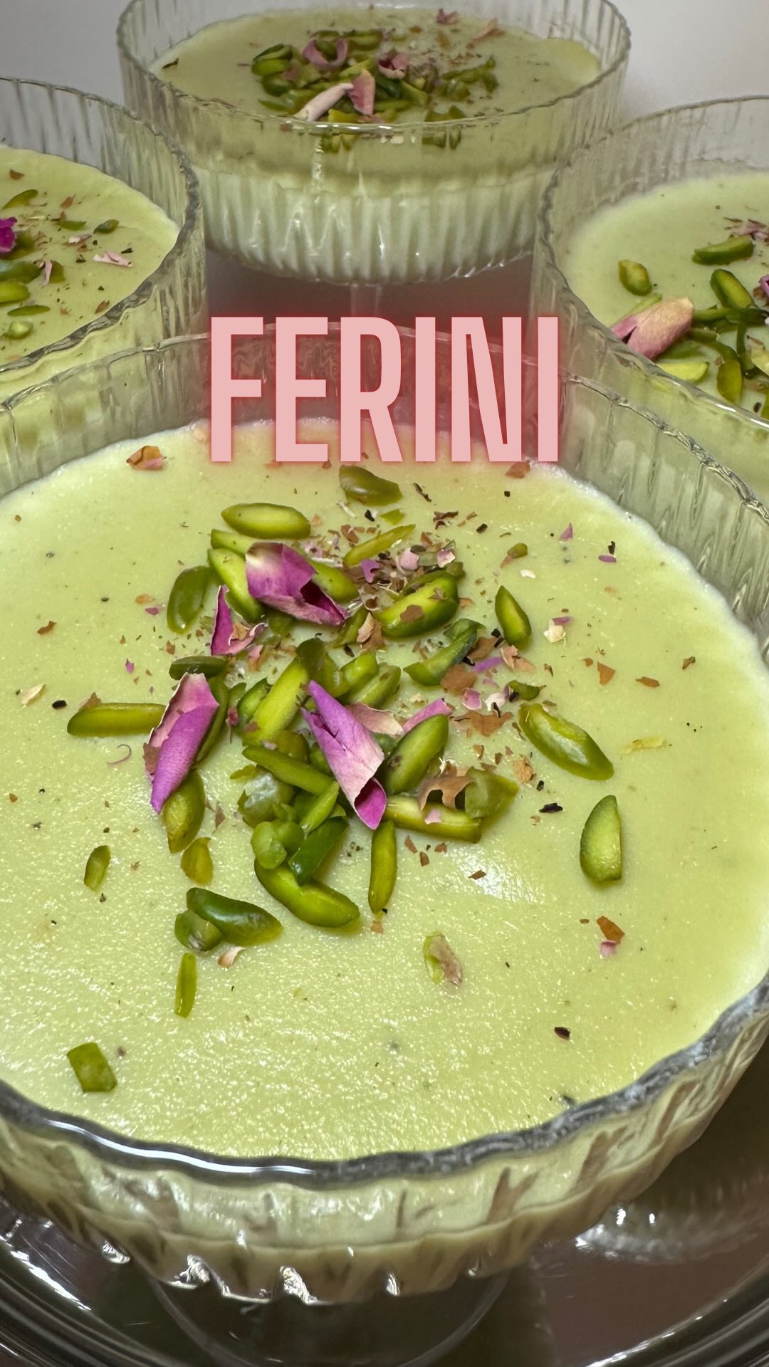 Pistachio Ferini ⬇️⬇️⬇️ RECIPE BELOW (Persian Rice Flour Pudding):
Ingredients:
• 100 grams rice flour
• 60 grams sugar
• 200 grams pistachio paste
• 1.2 liters milk
• 1 teaspoon ground cardamom
• 2 tablespoons rosewater
Instructions:
1. In a medium saucepan, combine cold milk, rice flour, sugar, and ground cardamom.
2. Whisk the mixture thoroughly until the rice flour is fully dissolved into the milk.
3. Place the saucepan over medium heat and stir continuously. Once the mixture begins to bubble, reduce the heat to medium-low to prevent it from sticking to the bottom of the pan.
4. Continue stirring for about 10-15 minutes, until the pudding thickens to a creamy consistency.
5. Add the pistachio paste and rosewater. Stir well to combine and cook for another 5 minutes until fully incorporated.
6. Spoon the pudding into serving dishes while it’s still hot.
7. Ferini can be served both hot and cold. If you prefer it cold, refrigerate the servings for a few hours before serving.
8. Garnish with dried edible rose petals and crushed pistachios before serving.
Enjoy your Pistachio Ferini as a rich, fragrant dessert!
#ferini #ricepudding #dessert #food #foodie #delicious
#persianfood #persiancuisine
#persiansweets #iraniansweets #iranianflavors #rosewater #pistachio #rosepetals
#pistachiopaste #persiandessert