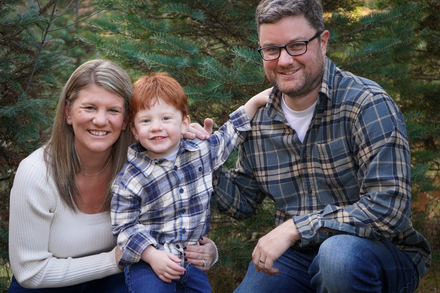 I met this family at my Oak & Iron pop up last year and like many busy families, they reached out to me worried the opportunity for fall foliage pics was gone and didn’t know what to do for holiday cards the week before Thanksgiving.
Fear not! I had the perfect location in mind of an old Christmas tree farm that’s now a park in Lowell and as luck would have it, near where they lived. It was meant to be! 🌲
We captured a bunch of sweet photos with the afternoon light that made my little friend’s ginger hair pop ❤️ Scroll to the end for my favorite impromptu photo when he climbed up on his parents for the perfect pose! ⭐️