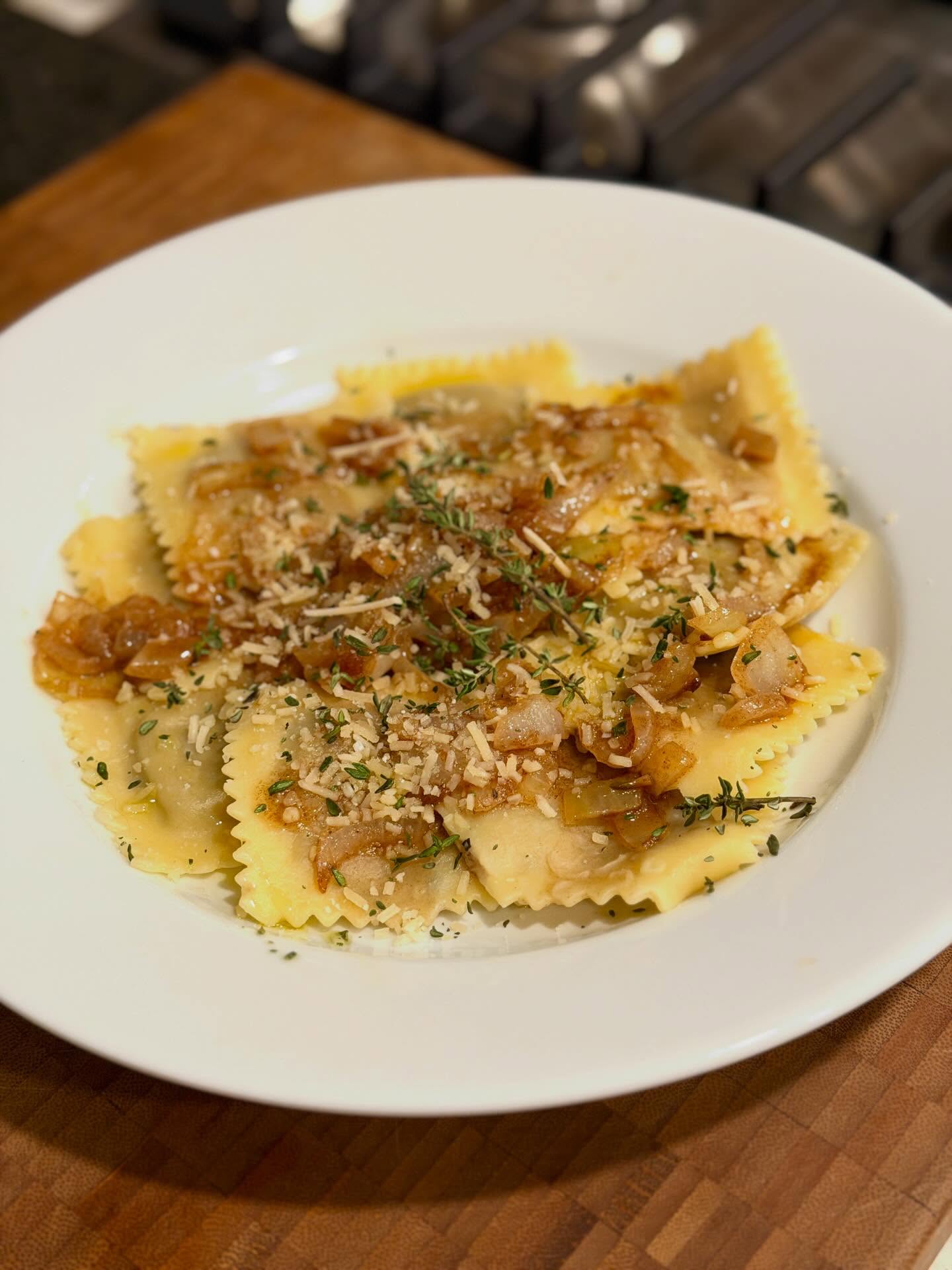 Made myself #mushroomravioli with a #tamarind #caramalizedonions compote. #parmesan #thyme #delicious #pasta #homemade