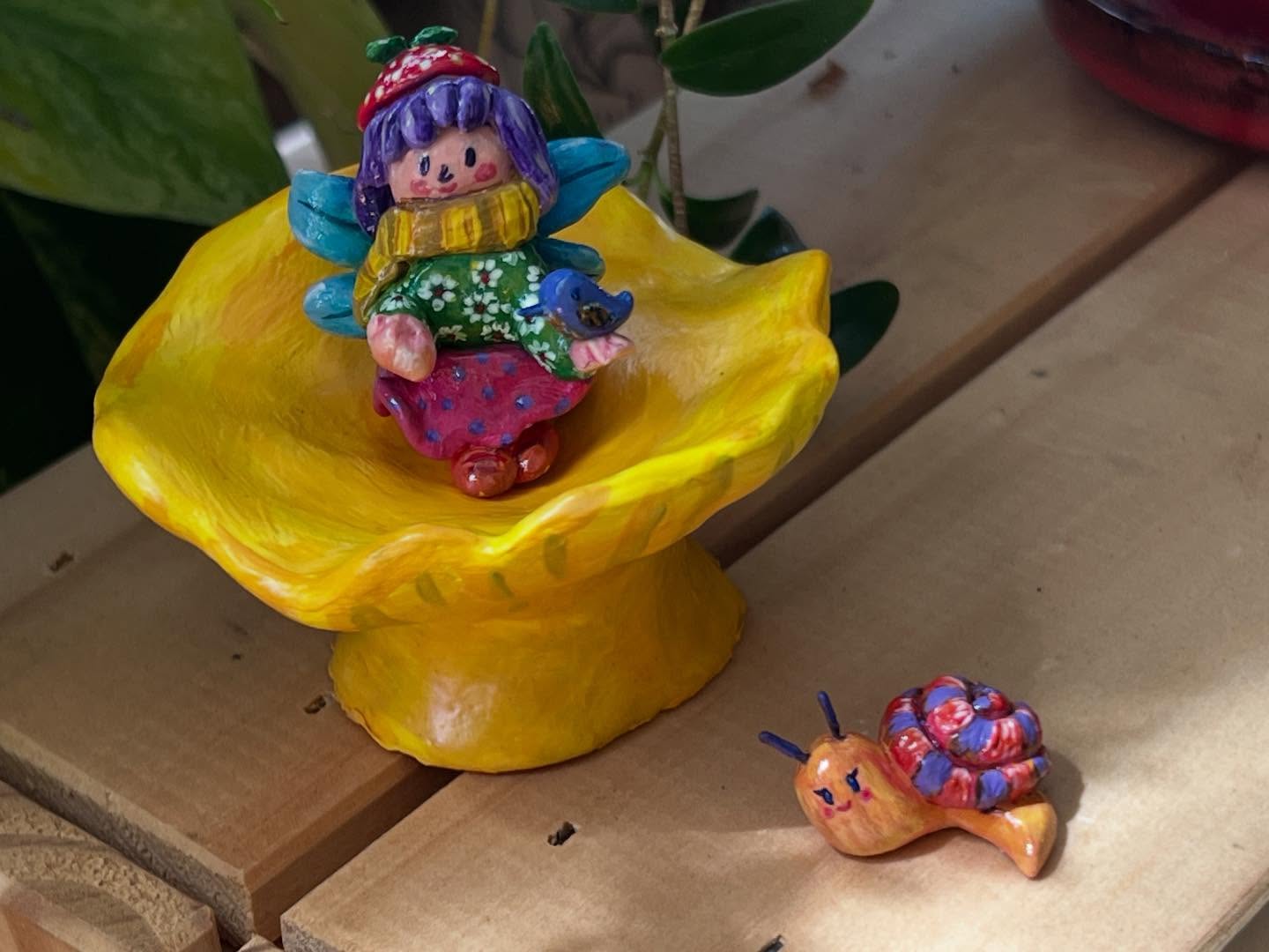 I made this set of mushroom, fairy, and her snail companion with polymer clay — tiny pieces meant for a desk, shelf, or fairy garden. They can be moved around to create little scenes, inviting imagination and storytelling while nurturing our inner child. ✨🌼🧚♀️🐌
#polymerclay #miniatures #fairyart #deskdecor #shelfdecor #fairygarden #tinyart #handmadeart #whimsicalart #innerchild #storytellingart #etsycrafters #etsyshop #etsyhandmade