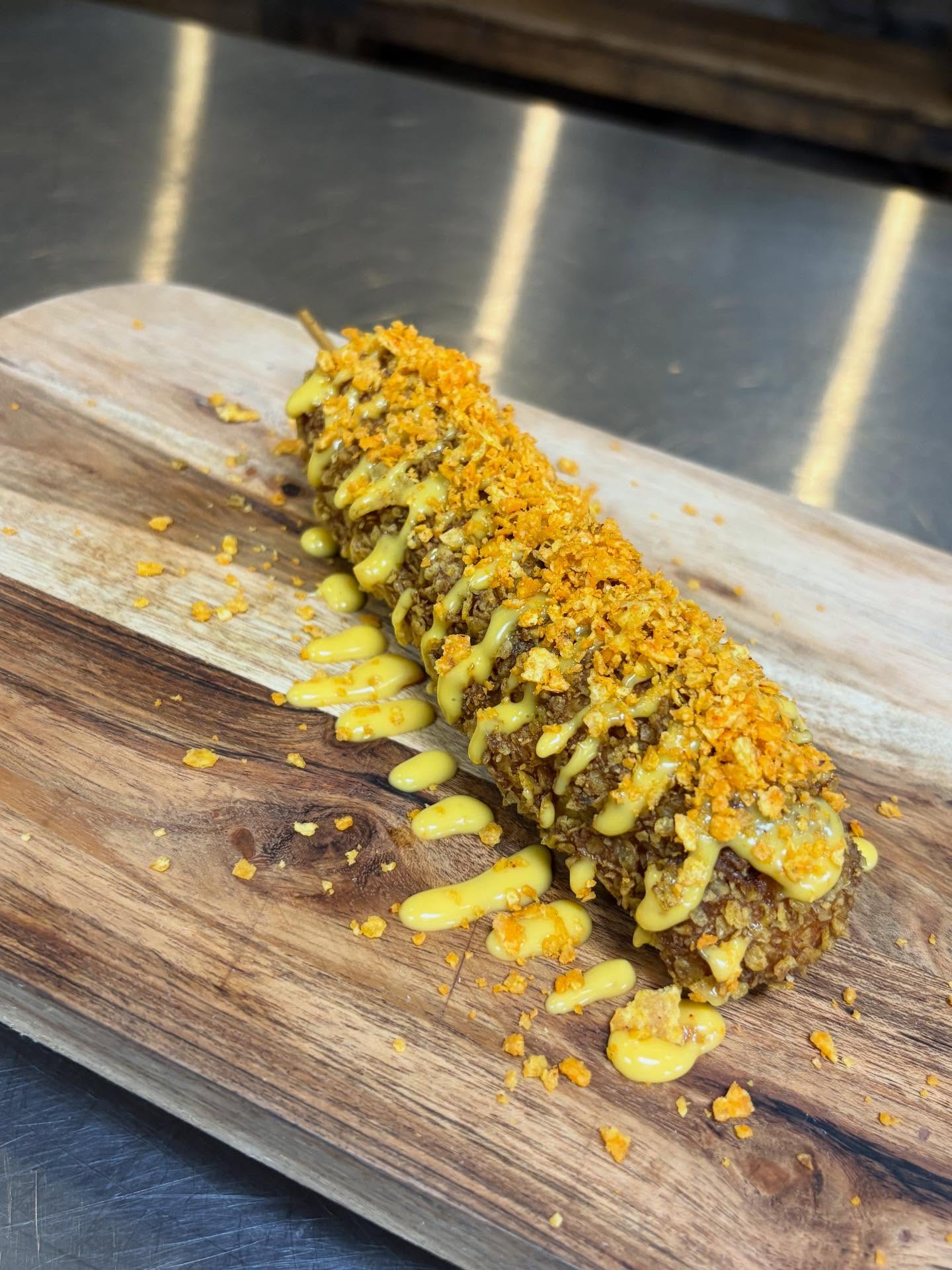 It’s Friday and our kitchen is cooking up some amazing new specials that’ll make your taste buds do the happy dance this weekend, so stop in or get it delivered before we eat it all!
Doritos Nacho Cheese Encrusted Korean Corndog🌭🔥
Grilled Chicken Sando 🐓 🔥
Smoked Hot Link 🌭🔥