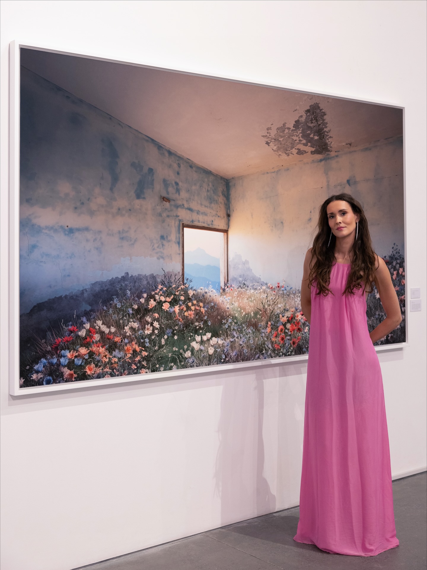 'A New Era' (2025)
Part of The Wild Within, an exhibition by @ryan.koopmans & @alice.wexell at @leilahellergallery
Located at Alserkal Avenue, Dubai, on display until mid January.
This piece measures 263 cm x 148 cm (104” x 58” inches) and depicts a beautiful abandoned building in the desert of Sharjah, UAE.
The artists meticulously digitally sculpt the flowers, grasses, and plants, integrating them into the original image of the building, which they research, explore, and photograph.
In the artwork, layered histories resurface through the quiet encroachment of nature, where time, architecture, and memory converge in a single vision of transformation, held in an infinite loop of growth and decay.