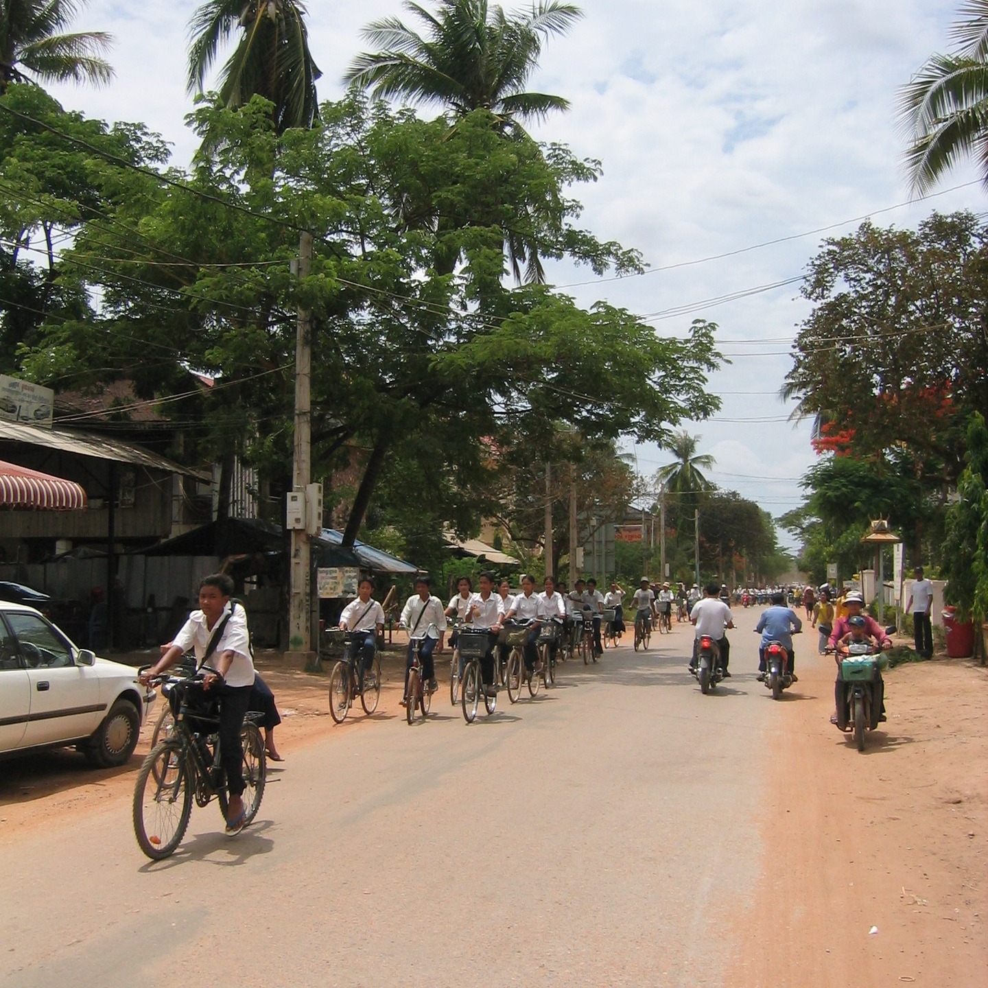 Passage from Travels in the Land of Hunger: A backpacker's earthbound journey from the East to the West 🌏📖
Tuesday, May 20, 2004
I walked to a bank and was badgered along the way by one moto-taxi driver after the other, who either offered to take me around Siem Reap or Angkor. I politely refused all offers and kept walking. At the bank, I exchanged some money and then walked past the Psah Chas (“Old Market”), lined outside with small vendor shops that sold souvenirs to tourists. I decided to walk across a bridge and explore the area outside town. Walking, I saw many thatched homes built on stilts and the occasional affluent home. I also found a small library a Japanese woman had founded.
I backtracked and decided to walk east out of town on the main road, and along the way ...
#TravelsInTheLandOfHunger #travelmemoir #memoirwriting #authorlife #indieauthor #bookexcerpt #backpacking #backpackinglife #solotravelers #travelphotography #travelreflections #cambodia #cambodiatravel #adventuretravel #traveldiaries #siemreap