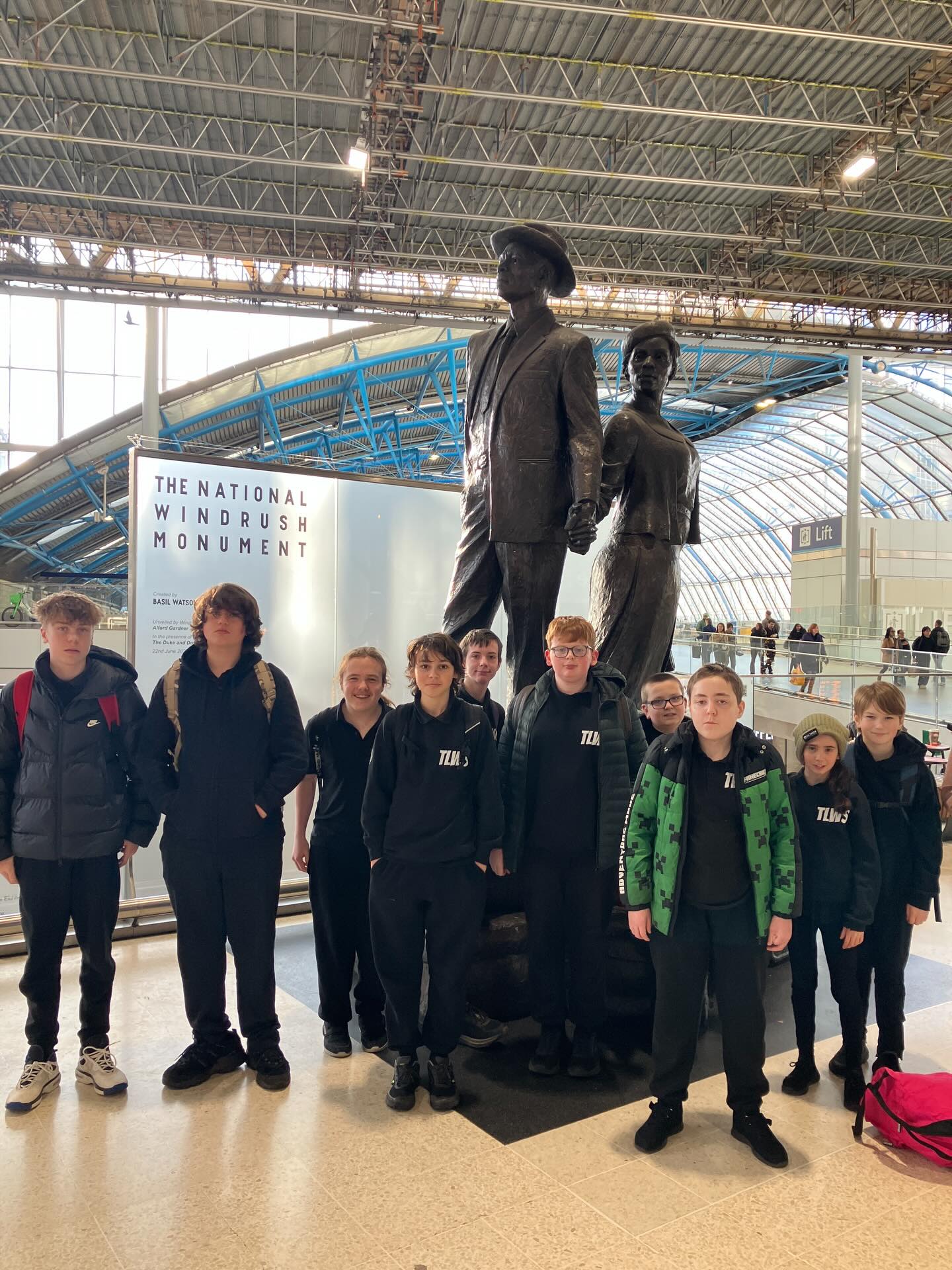 Our school council reps have arrived at Waterloo. Here they are with the National Windrush Monument - the start of a great cultural day!