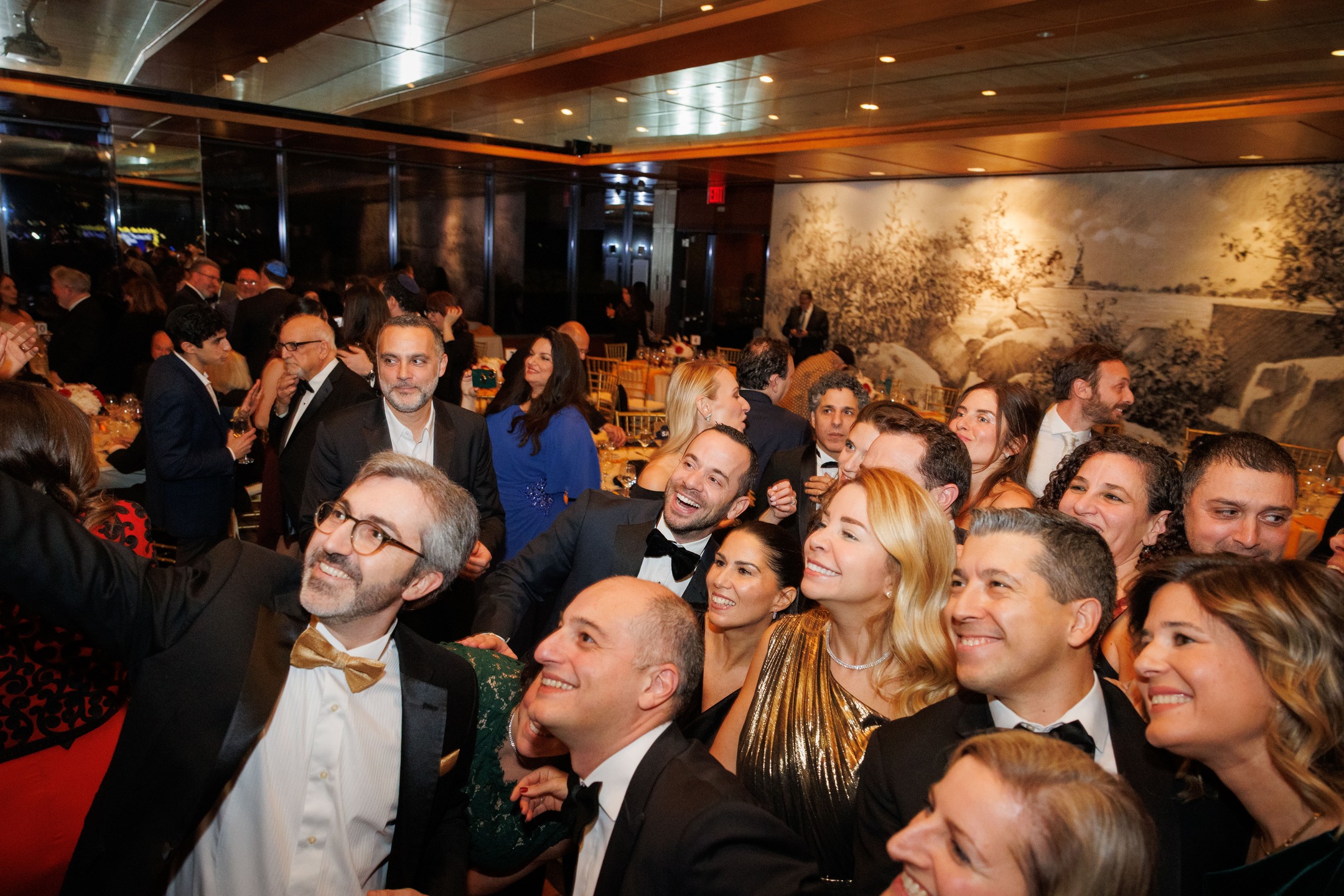 The International Sephardic Community Gala was a truly exhilarating celebration and an amazing kick-off to our 110th anniversary year! We brought together over 250 guests from Sephardic communities across the United States and around the world—some traveling from as far as Istanbul, Amsterdam, London, and Athens. The evening pulsed with energy as attendees enjoyed fantastic Greek, Ladino, Turkish, and Israeli music, unforgettable foods and drinks, a special Turkish Jewish dancing troupe from our community, and inspiring remarks that highlighted the resilience, warmth, and vibrancy of Sephardic life today.
We heard inspiring words from some of our leaders like President Sedat Behar and Gala Chair Lexi Fellus, a fantastic 110th anniversary video highlighting the wonderful diversity of our multigenerational community, and a powerful and moving speech from our Bivas - Ladino High School Club of America Student President Simeon Maman, whose words touched our audience deeply.
A major highlight of the night was honoring our extraordinary awardees: Joel Benoliel received the Lifetime Community Service Award, Sarah Levin was celebrated with the Young Leadership Award, and Mitch Julis was recognized with the Service to Humanity Award. The Gala left everyone uplifted and proud, a powerful reminder of our shared legacy and the bright future we are building together.
The theme that echoed throughout the night—Aki Estamos, we are here—was felt powerfully, and indeed our Torah values, traditions, pride, and care for one another shone through in every moment.
Mersi muncho - thank you all for celebrating with us, and Si Kere El Dio, with God’s help, here’s to 110 more years of a thriving Sephardic community!