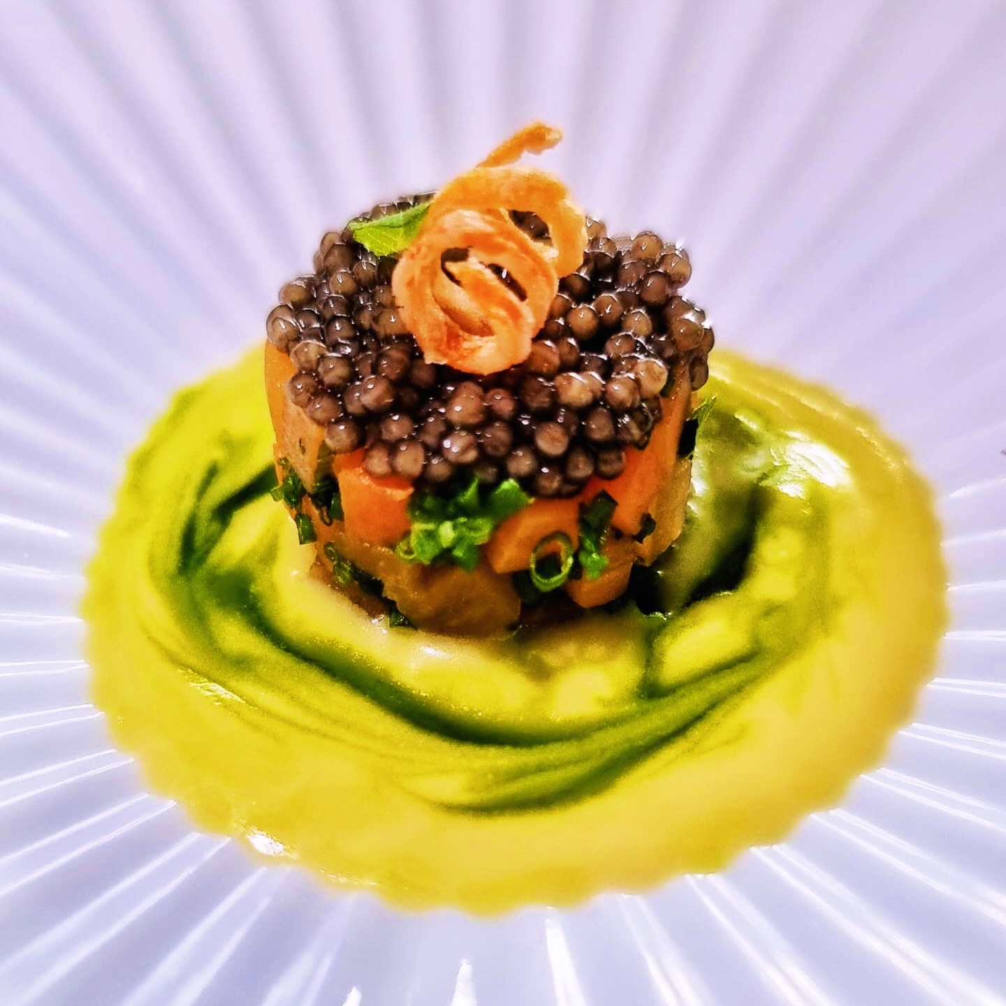 The wet months of Autumn bear fruit come Winter. Beneath the frosty ground, warmer days are remembered in deep soil, where roots thrive in the last of temperate Summer’s fertile sultriness.
We celebrate the underground heroes of Winter in two dishes dedicated to root vegetables in the INVERNO Chef’s Table menu.
The first is simply named ‘Carota’ because every element brings the taste of the star to the fore. Nothing is superfluous; shiso mint, chives, beurre blanc, royal oscietra caviar … enhancing natural sweetness, earthiness, and herbal aromatics while taming bitter-tasting terpenes.