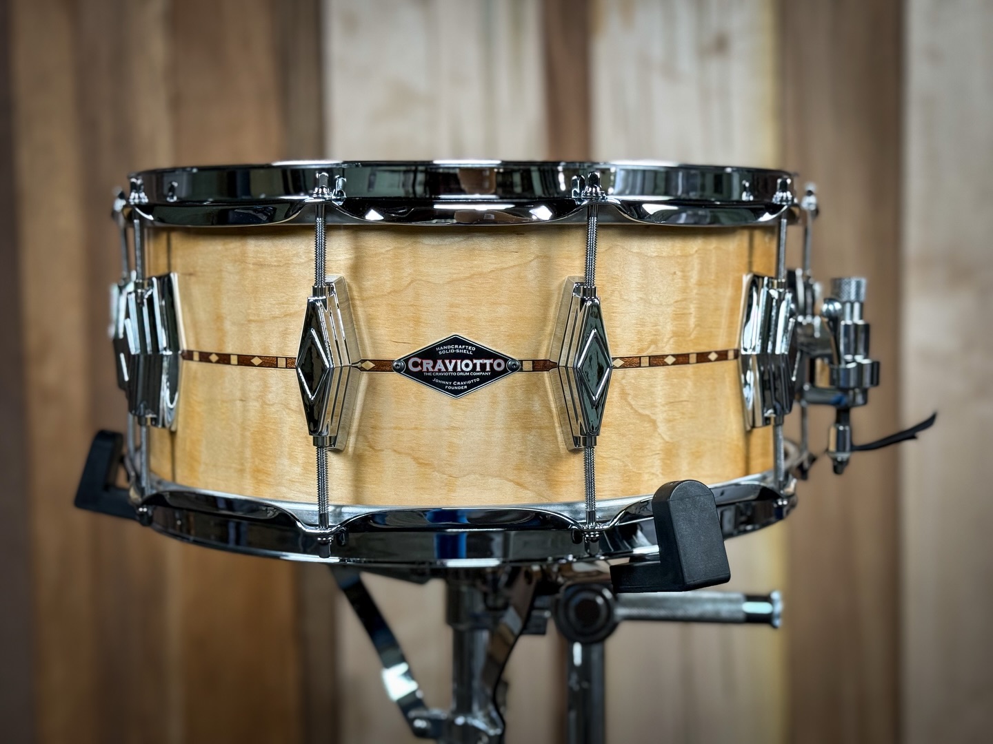 Custom Shop 6.5x14 Maple (w/ curl), with walnut inlay, baseball edges, satin oil finish, and diamond cast lugs.