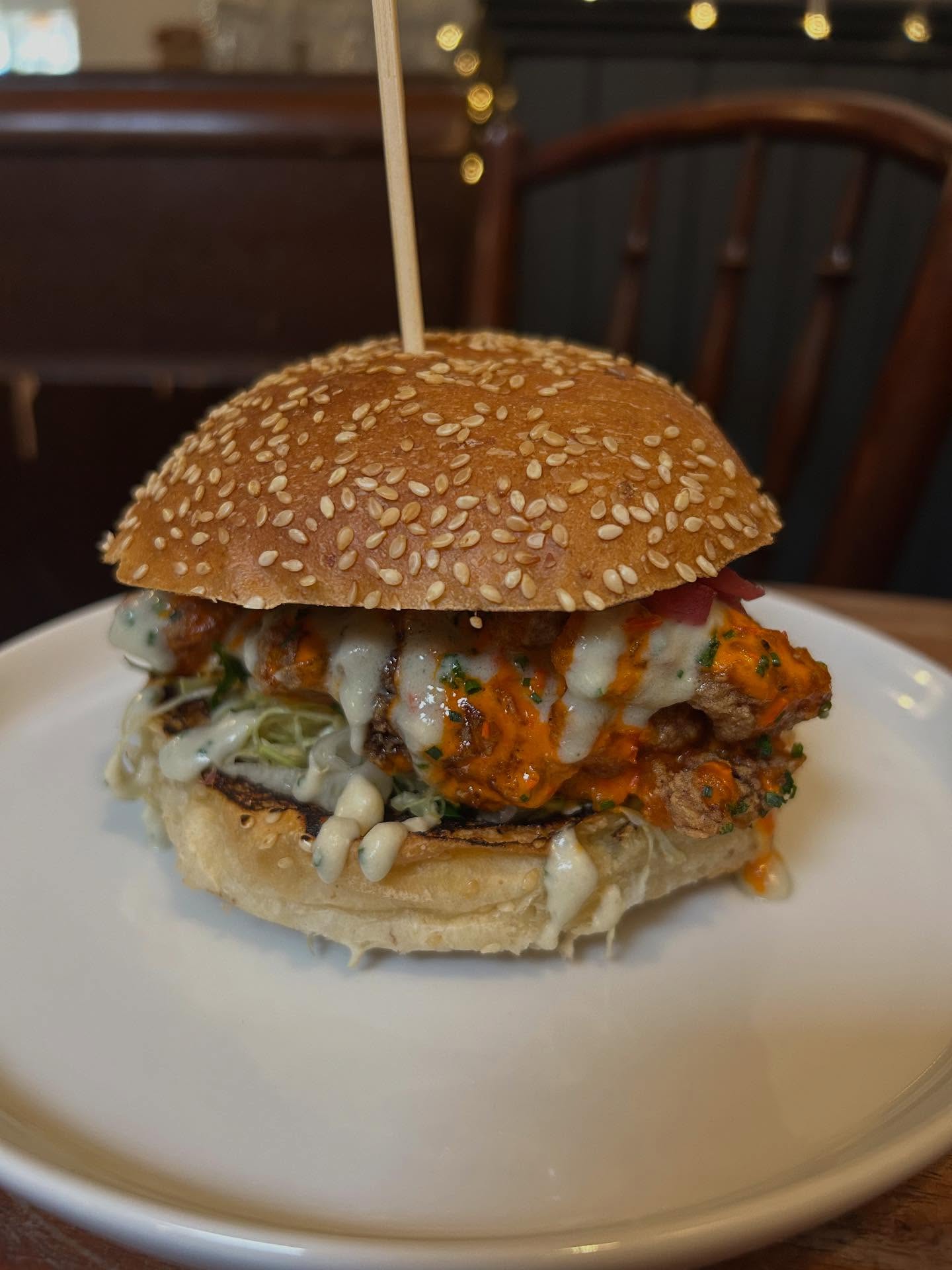 Buffalo Chicken Bun, Buttermilk Chicken Thighs, House Buffalo Sauce, Blue Cheese Dressing #houseferments #insanelydelicious #toohotforthedog #bonuspic