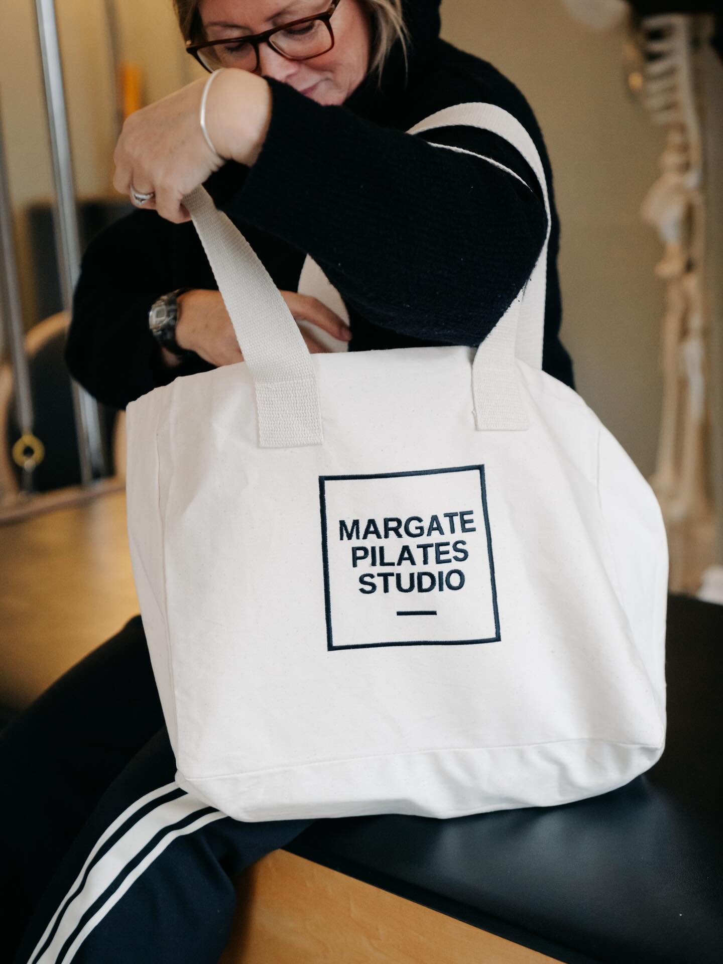 Some of you have already nabbed your merch hot of the press!!
Hayley has been chief promoter (and Lesley one of our clients) of socks and bags.
We’re true advocates for barefoot in our studio, but in the colder months we totally understand the necessity for socks - our grippy socks are comfy and warm and so far, one size really does fit all!
Bags are £25
Socks £12
And as ever, don’t forget Gift Vouchers are available should you want to buy for someone, or hint for someone to buy you!!
Get in touch if you’d like to purchase.
We’re sure we’ll see you before, but have a wonderful festive break and look forward to another year of Pilates with you all
Cat, Neil, Hayley, Claire, Katy & the trainees x