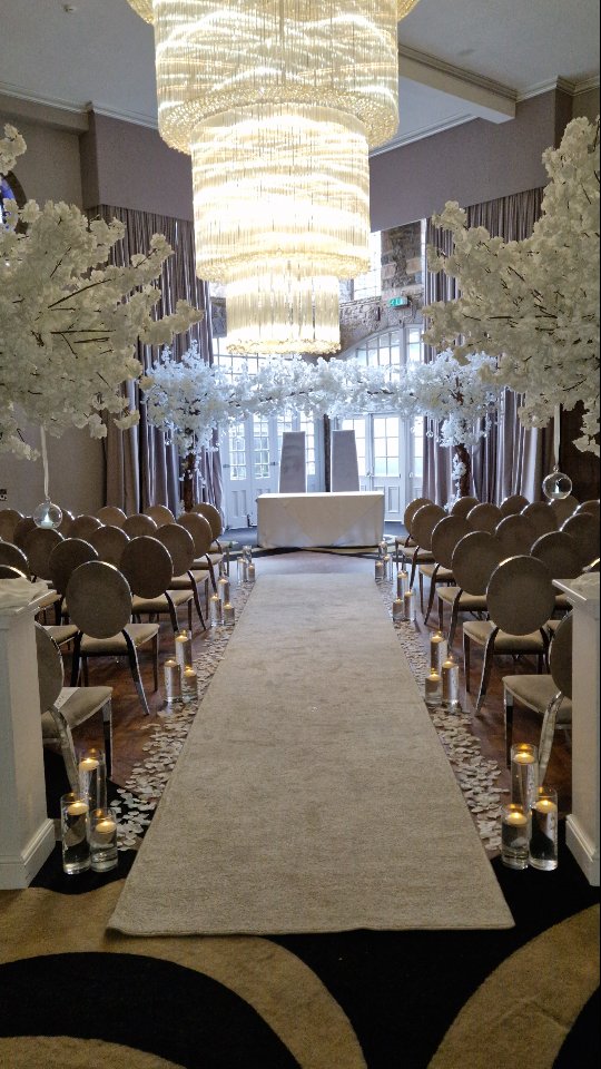A huge congratulations to Jade and Lewis who got married this weekend at the lovely @derwentmanorhotel
Our white blossom trees are always a perfect fit for this venue especially when the light hits them just right through the windows in the grand hall.
A simple ceremony of white blossoms with floating candles is sometimes all you need with a venue like this.
Venue: @derwentmanorweddings
Content Creator : @dreamdaysocials
Photographer : @stephenbeecroft
Glam : @notsoblandbeauty
Hair : @bridalbybellaandco @bellaandco___
#durhamweddingphotographer #durhamweddings #whitewedding #weddingstyling #weddingaisle