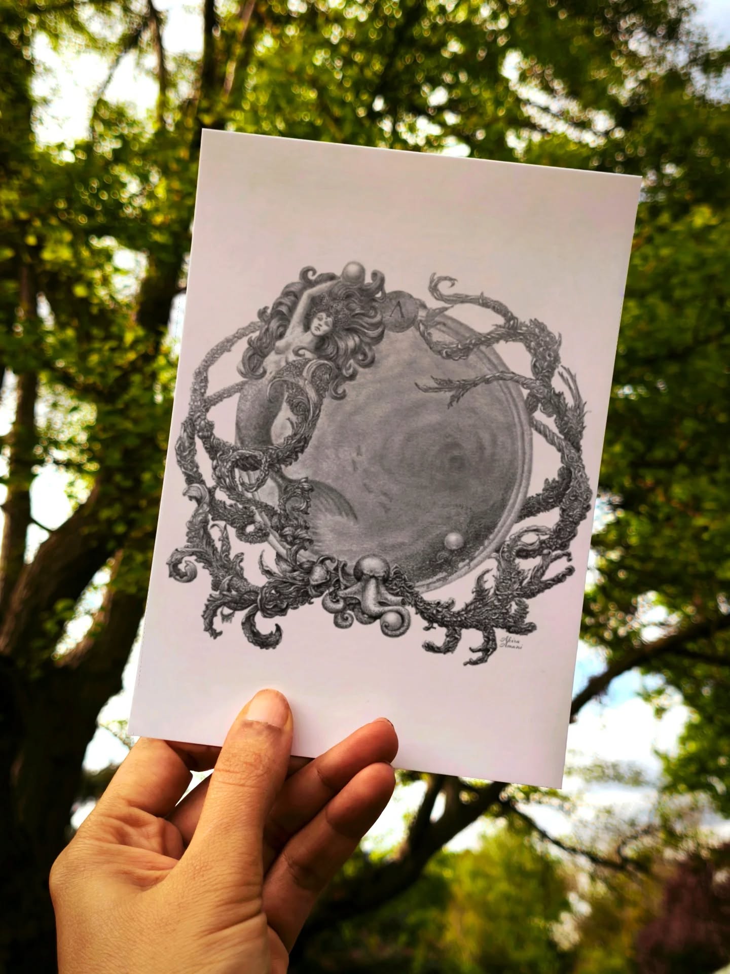 NACRE
Legends told of three pearls, more precious than all else: the mermaid kept one safe, the octopus claimed another with ruthless strength, and the third drifted in the abyss, awaiting the hand bold enough to unite them and command the seas.
Graphite and charcoal pencil on tinted textured paper.
Drawn from my imagination. This took about 3 weeks to complete.
#mermaidart #folkloreart #graphiteart