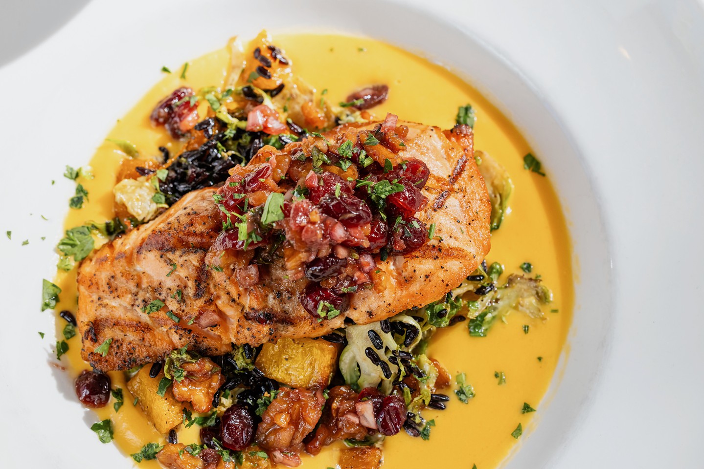 perfectly grilled salmon — served with forbidden rice, roasted brussels sprouts, creamy butter....