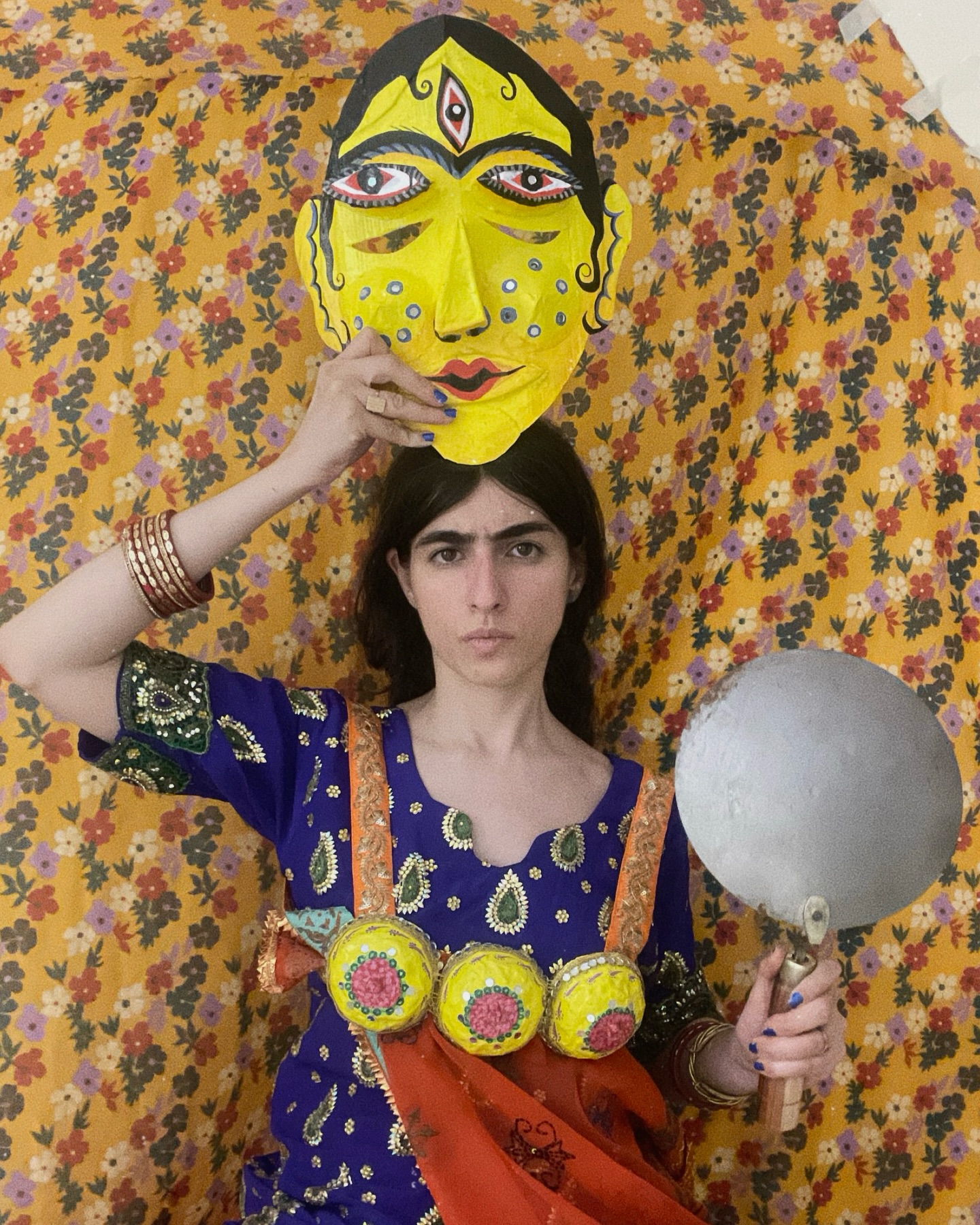 WIG Wednesday - Saba Niknam (@huginmunin1988)
Saba Niknam is an Iranian–French multidisciplinary artist working across textiles, embroidery, felt, animation, and folk mythologies. Her practice explores the invisible threads connecting cultures, drawing from Persian ancestral rituals, women’s craft traditions, and the everyday life of the places she travels through.
Her work blends mythology, migration, and contemporary landscapes, creating encounters between ancient symbols and modern streets. She has participated in international residencies including Villa Swagatam (India), Atelier Mondial (Switzerland), and Casa San Agustín (Mexico).
Swipe through to see Niknam’s ‘The Shadow of Our Ancestors’
“The Shadow of Our Ancestors began during my residency at Villa Swagatam in India, when I felt an uncanny sense of familiarity everywhere I went. Walking through temples, streets, and markets didn’t feel like discovering a new place, it felt like remembering something ancient inside myself.
In the saturated colors, the devotional rituals, the weaving traditions, and the rhythm of everyday life, I could suddenly recognise echoes of my own cultural memory. Persia and India two old worlds shaped by fire, gods, myths, and cosmic dualities mirrored each other in ways I hadn’t expected.
What moved me the most was the presence of the unseen:
the shared belief in forces beyond the material world, in rituals that speak to the sky, the earth, the ancestors, and the spirits.
In this series, I overlay Iranian mythological figures of gods, demons, protectors, and folk characters onto contemporary scenes from India: scooters wrapped in embroidered cloth, rickshaws overflowing with toys, street vendors, red-lit temples, crowds of people. These figures appear like small apparitions, slipping into the daily life of another culture, symbols of an ancestor who has quietly followed us across borders.
It felt as if our ancestors migrated long before we did, carrying their stories with them, shapeshifting, surviving, and settling into new geographies.
The images blur time and space, suggesting that cultural memory is not fixed; it’s alive, breathing through color, pattern, and motion.”