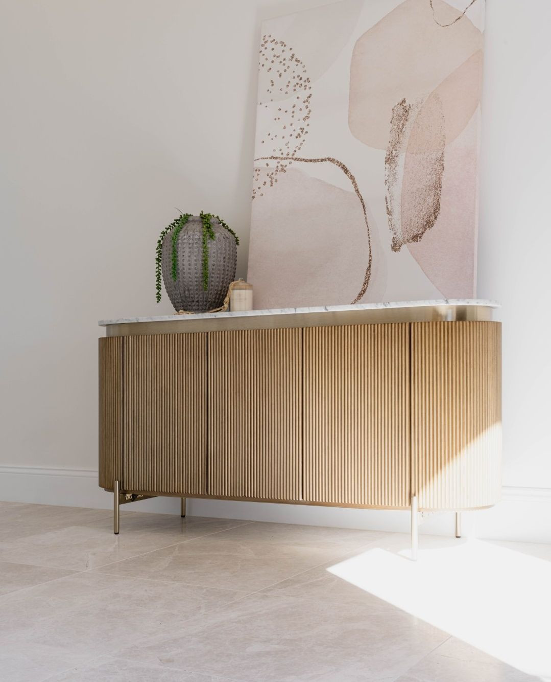 Elegant styling creates a warm welcome at Project Lewyn. We replaced flooring in the foyer with this stunning natural limestone to create a beautiful tactility in the space.
The texture and feel of natural stone is simply unbeatable. Just remember to seal it well and it will last forever.