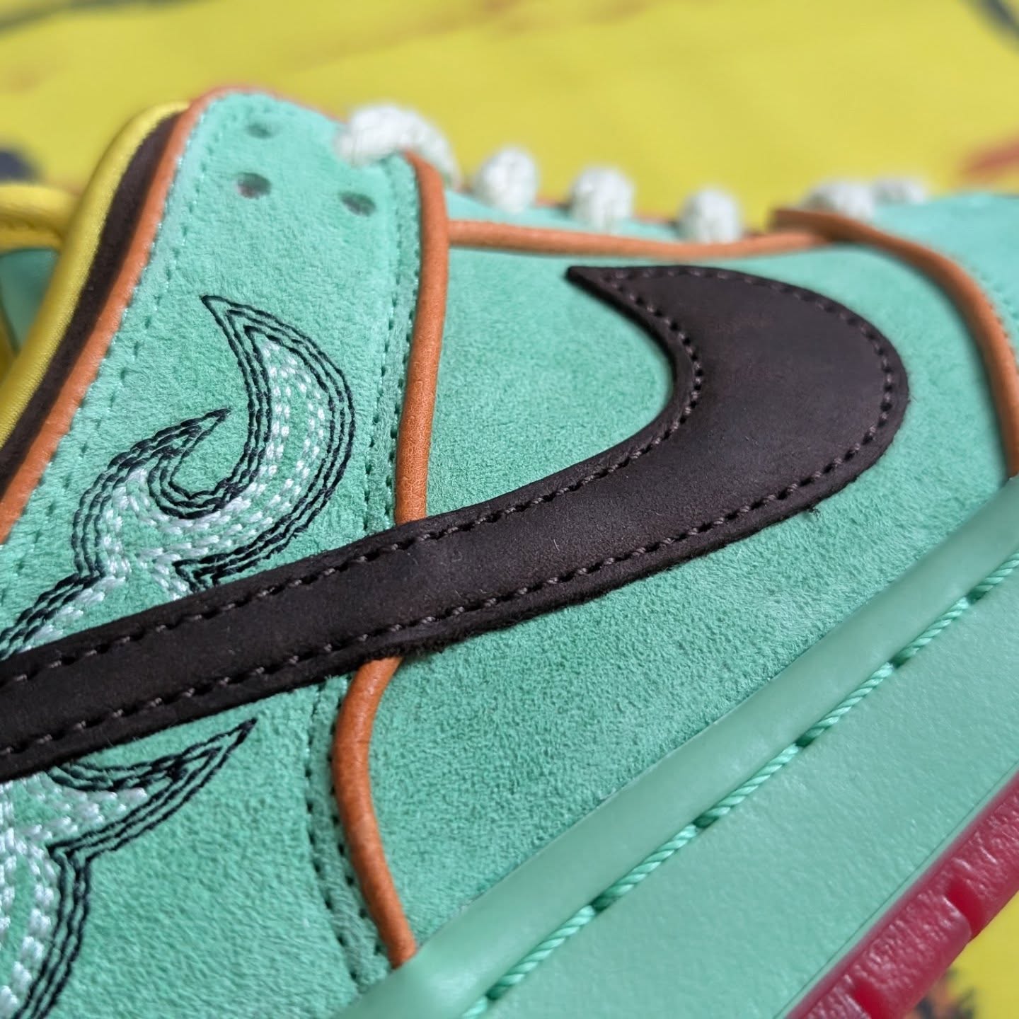 Well these grew on me. The Nike SB Dunk Low “Tourmaline” (aka “Rodeo”) is one of 2025’s standout drops — a tribute to the legacy of Black cowboys and their impact on rodeo culture.
Decked out in vibrant green tourmaline suede with brown leather, Monarch orange piping, and a translucent red outsole, it hits hard with a blend of bold color and Western soul. Love the rope laces, cowboy-boot-inspired stitching, the star-stamped heel, and lasso-style Nike branding. So frigging cool.
Love an insole graphic too. So that's nice. And it sits atop a Zoom Air unit for comfort. Even the packaging goes all-in, coming with a custom bandana printed with cowboy and cattle artwork.
Released in May 2025 as part of Nike’s Black History Month collection, the “Tourmaline” celebrates the often-overlooked contributions of Black pioneers in the American West — honoring the history, artistry, and grit that shaped rodeo culture.
#nike #nikeair #nikesb